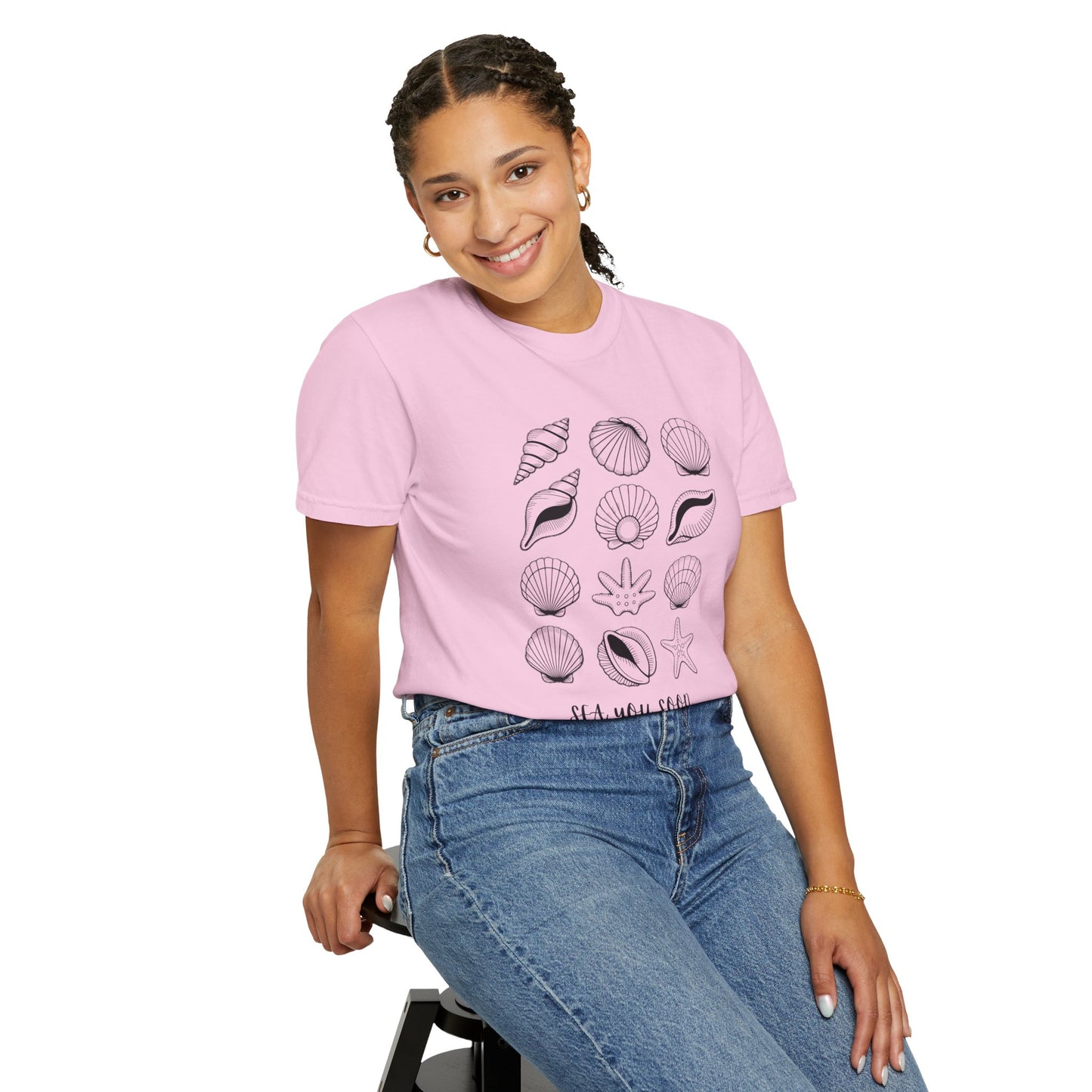 Seashells and Sea You Soon T-Shirt featuring a relaxed fit, crew neckline, and beach-themed design, embodying FireBrook Essentials' commitment to comfort and positivity. Ideal for casual, ocean-inspired moments.