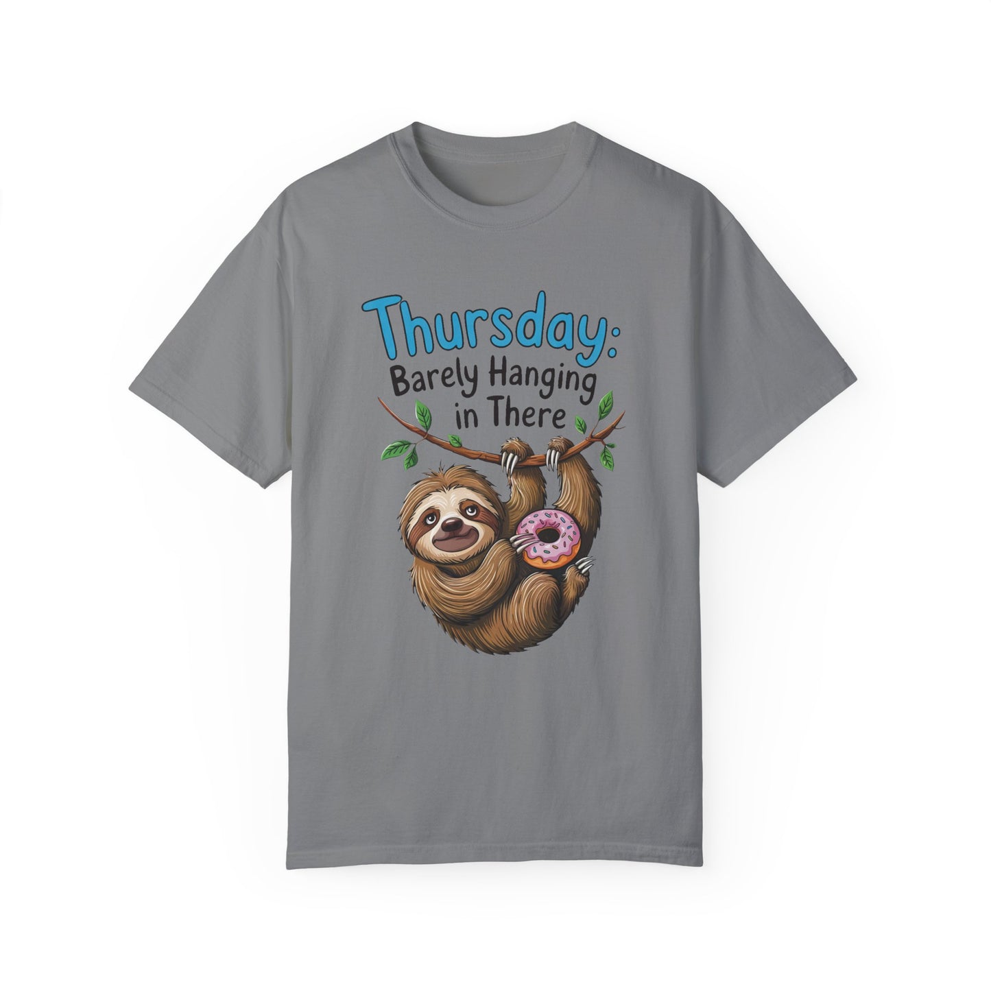 Thursday: Barely Hanging In There Sloth Graphic Comfort Colors Unisex T-Shirt features a sloth holding a donut, embodying a relaxed and motivational vibe, perfect for casual, comfortable style.