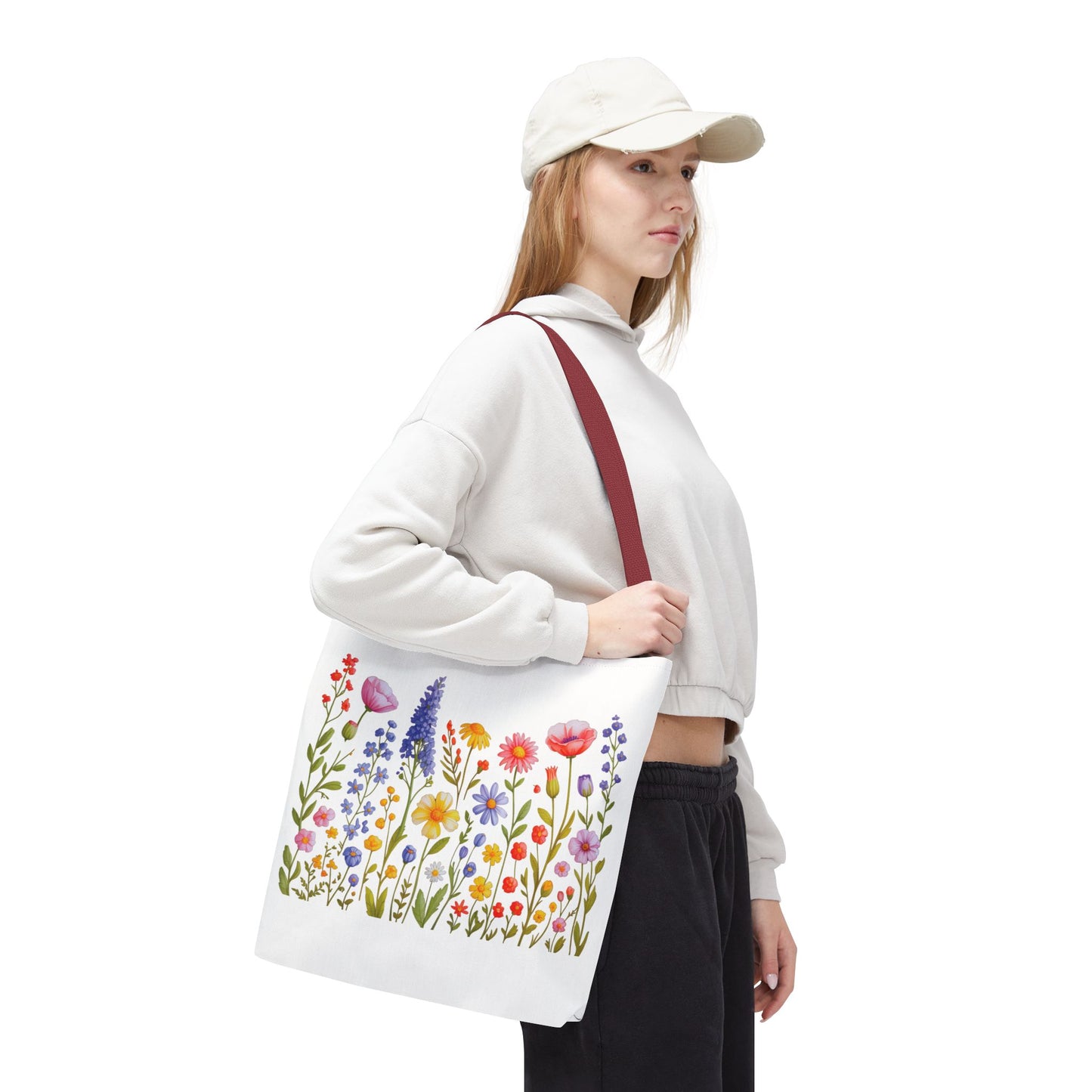Wildflowers Tote Bag featuring a vibrant wildflower design, embodying a free-spirited, natural vibe. Ideal for daily use, it offers durability with reinforced handles, boxed corners, and multiple size options.