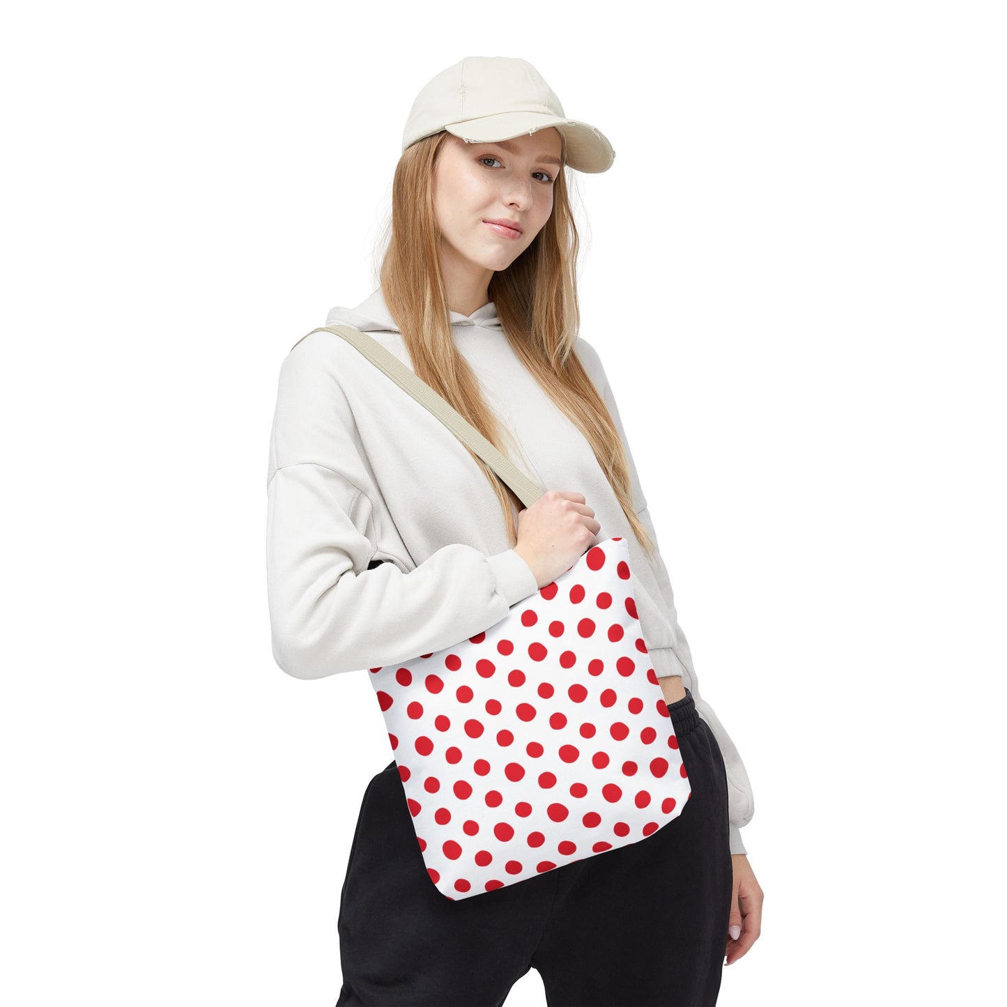 Red Polka Dots Tote Bag: A close-up showcases the durable, stylish bag with vibrant red polka dots, ideal for everyday use. Perfect for adding a playful touch to errands or beach days.