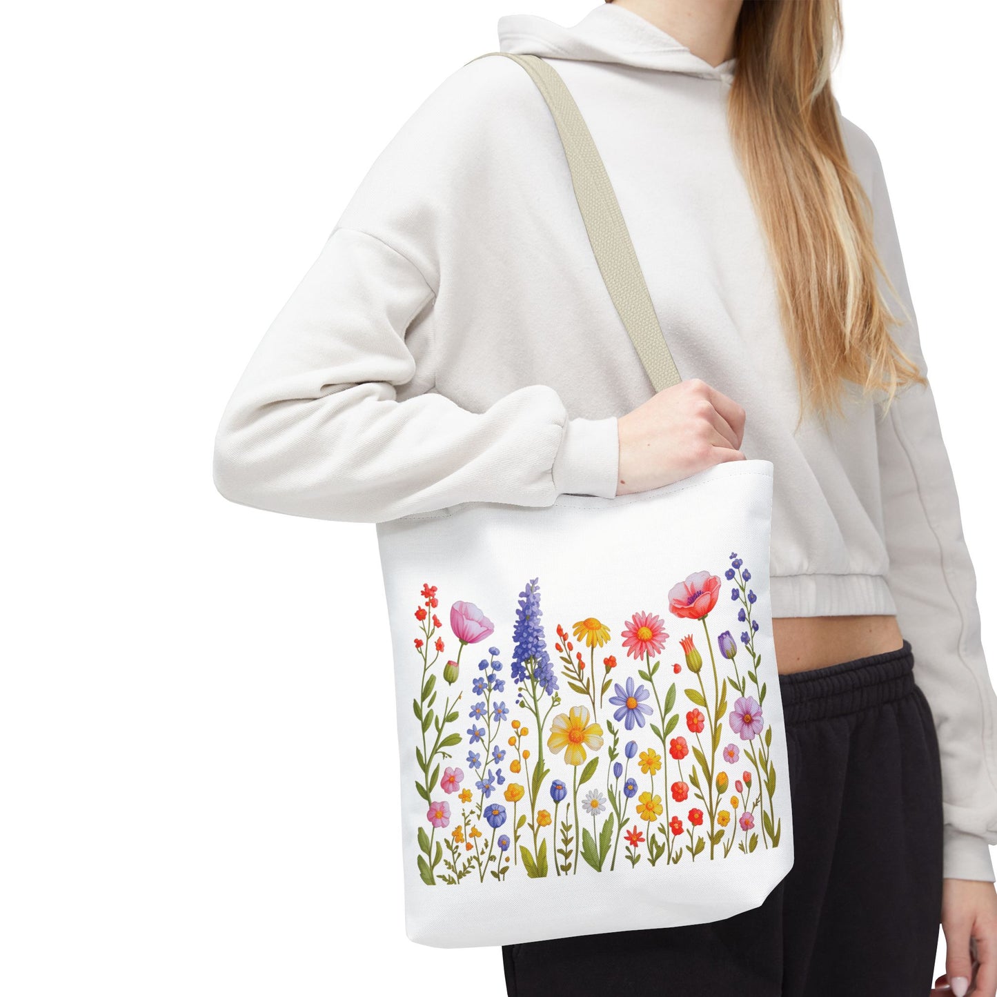 Wildflowers Tote Bag featuring a vibrant wildflower design, embodying a natural, free-spirited vibe. Ideal for nature lovers, versatile for everyday use with durable polyester, reinforced handles, and customizable options. Available in three sizes.