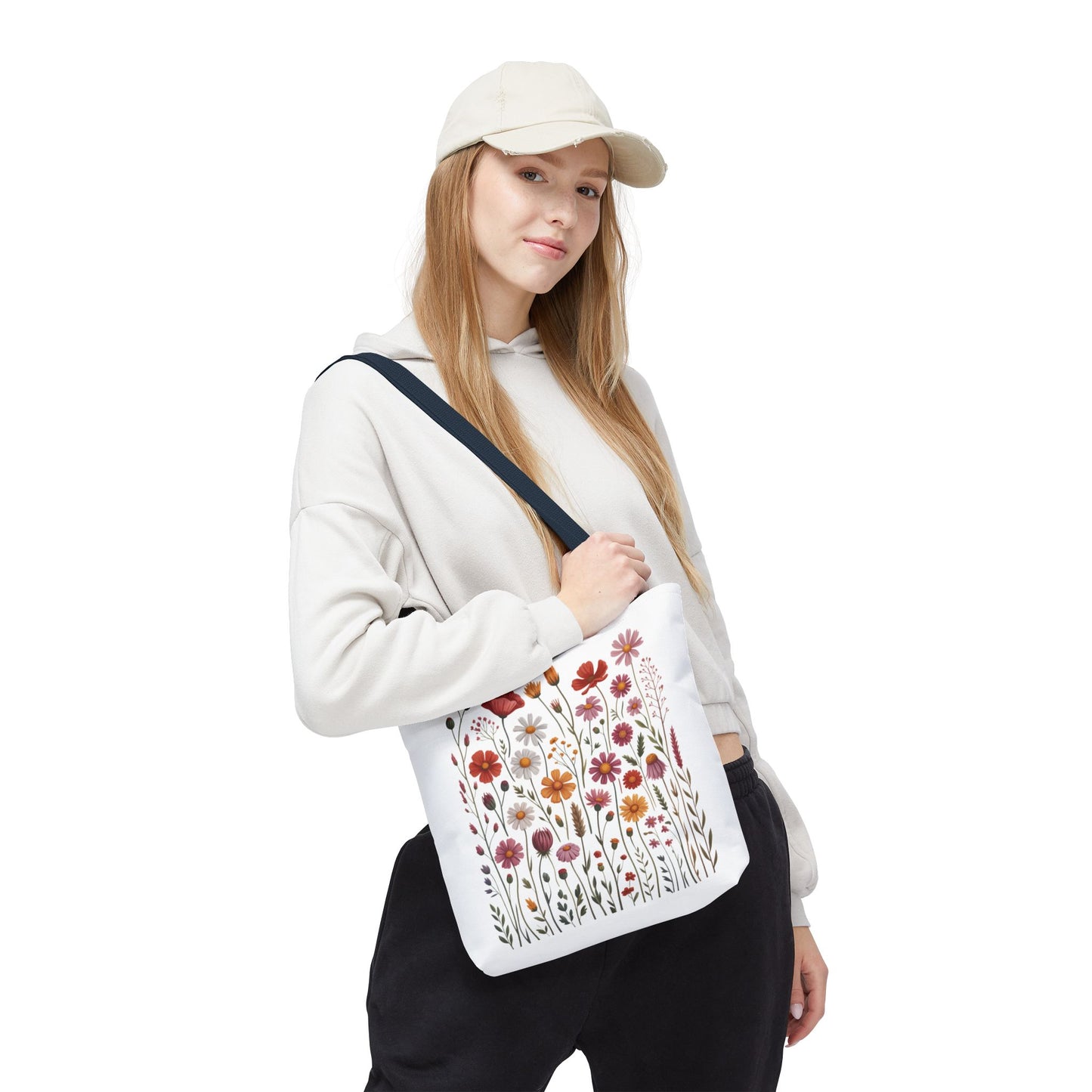 Wildflowers Tote Bag showcasing a calming floral design, ideal for everyday use. Features durable polyester construction with reinforced handles, boxed corners for extra space, and customizable options, embodying FireBrook Essentials' uplifting style.