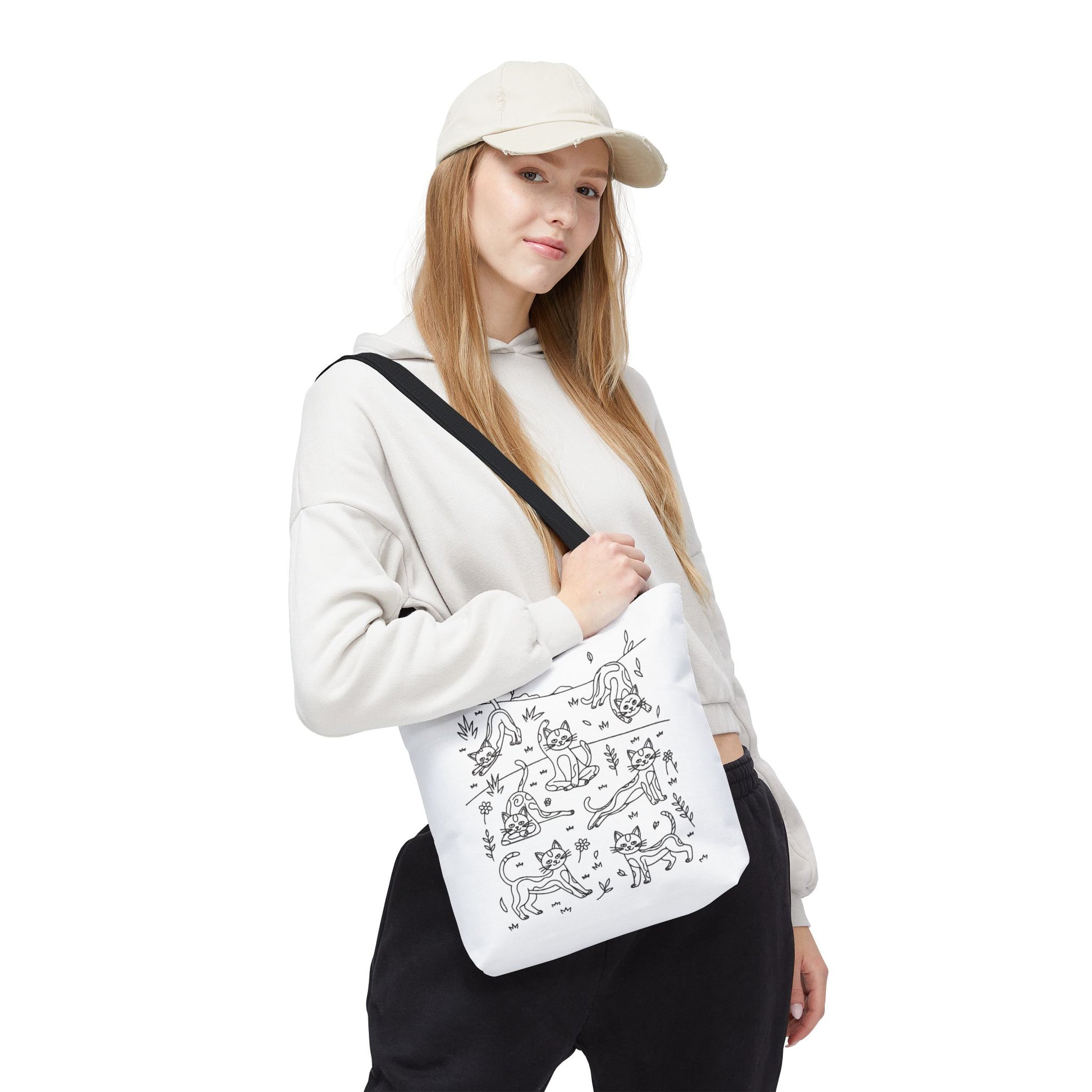 Yoga Cat Tote Bag featuring playful cat yoga poses, perfect for cat lovers and yoga enthusiasts. Ideal for everyday errands, this bag offers durability and style, reflecting FireBrook Essentials' uplifting design ethos.