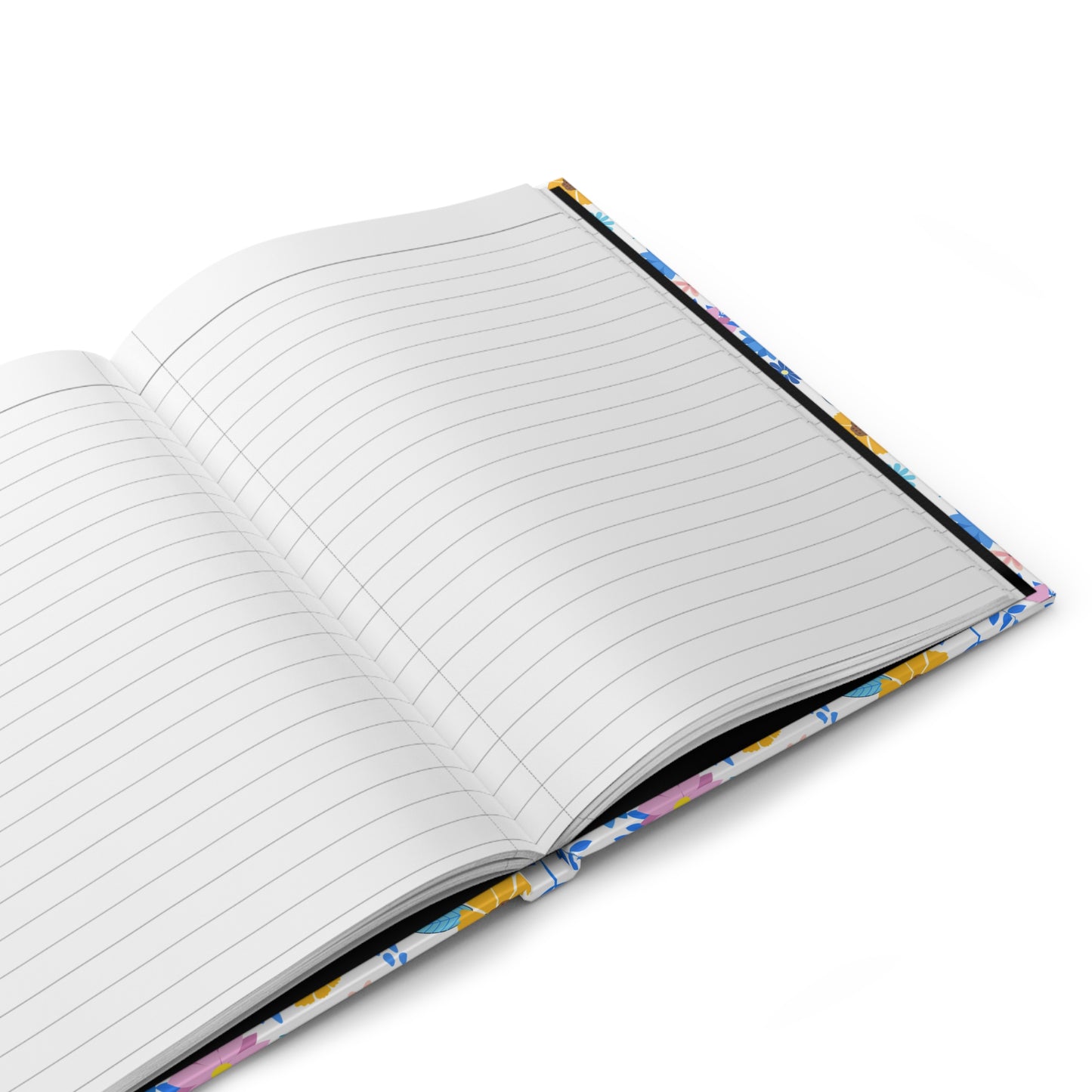 HARDCOVER JOURNAL, MATTE, RULED, 5X7, SEWN BIND, CLEAN-TEAR PAGES – CHEERFUL BLOOMS MIX features open, lined pages with a glimpse of its vibrant floral cover, reflecting FireBrook Essentials' joyful, uplifting design ethos.