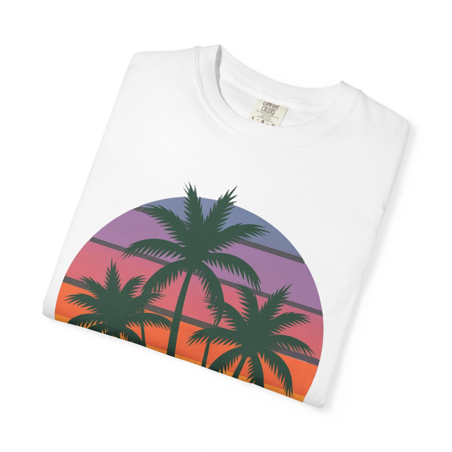 Palm Tree Sunset T-shirt showcases vibrant palm tree silhouettes against a sunset sky, exuding a relaxed, tropical vibe. Perfect for casual outings, it's crafted from soft, garment-dyed cotton for ultimate comfort.