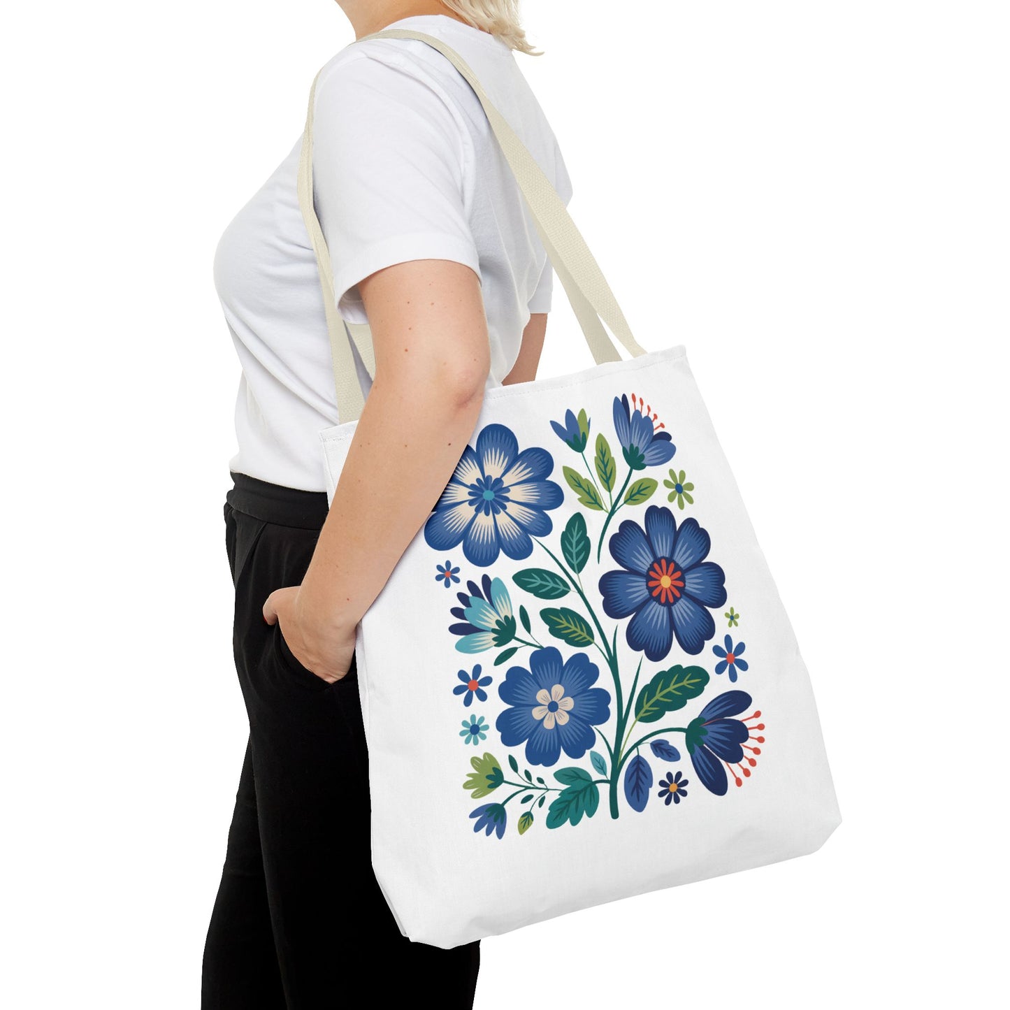 Vintage Blue Floral Tote Bag exudes nostalgic charm with its seamless black inner stitching, reinforced handles, and boxed corners, offering style and durability. Available in various sizes with five handle color options.