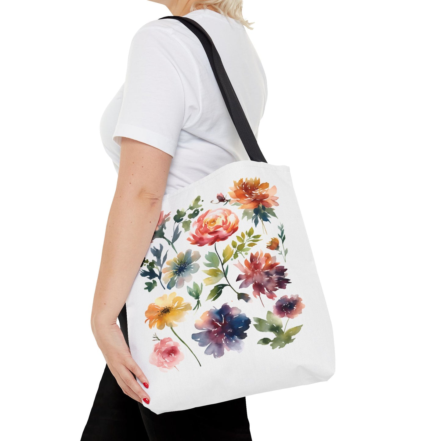 Watercolor Floral Tote Bag held by a woman, showcasing its vibrant floral design and practical size, ideal for stylish, everyday use.