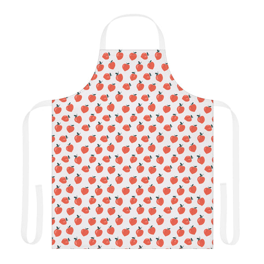 Peaches Apron featuring whimsical apple patterns, perfect for the creative chef. Made from polyester canvas with adjustable tie-back for comfort. Ideal for vibrant, joyful cooking experiences.