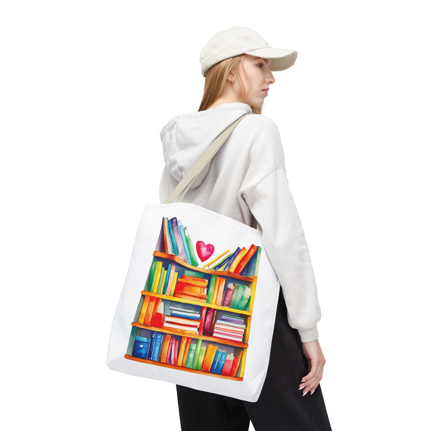 Books Tote Bag - 100% Spun Polyester, worn by a woman in a white hat and sweatshirt, features a book pattern, ideal for book lovers.