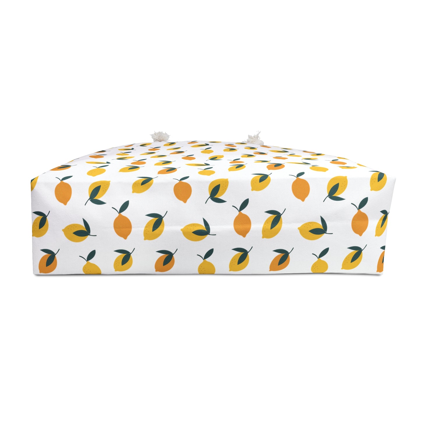 Lemon Print Weekender Bag - Travel Tote featuring a vibrant lemon pattern and green leaves. The spacious, stylish design with comfortable rope handles is perfect for beach, gym, or yoga trips.