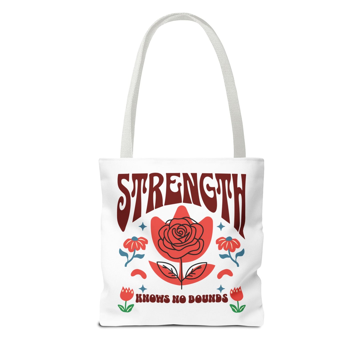 Strength Knows No Bounds Tote Bag with red and blue text, featuring a red flower, ideal for daily use and gifting.