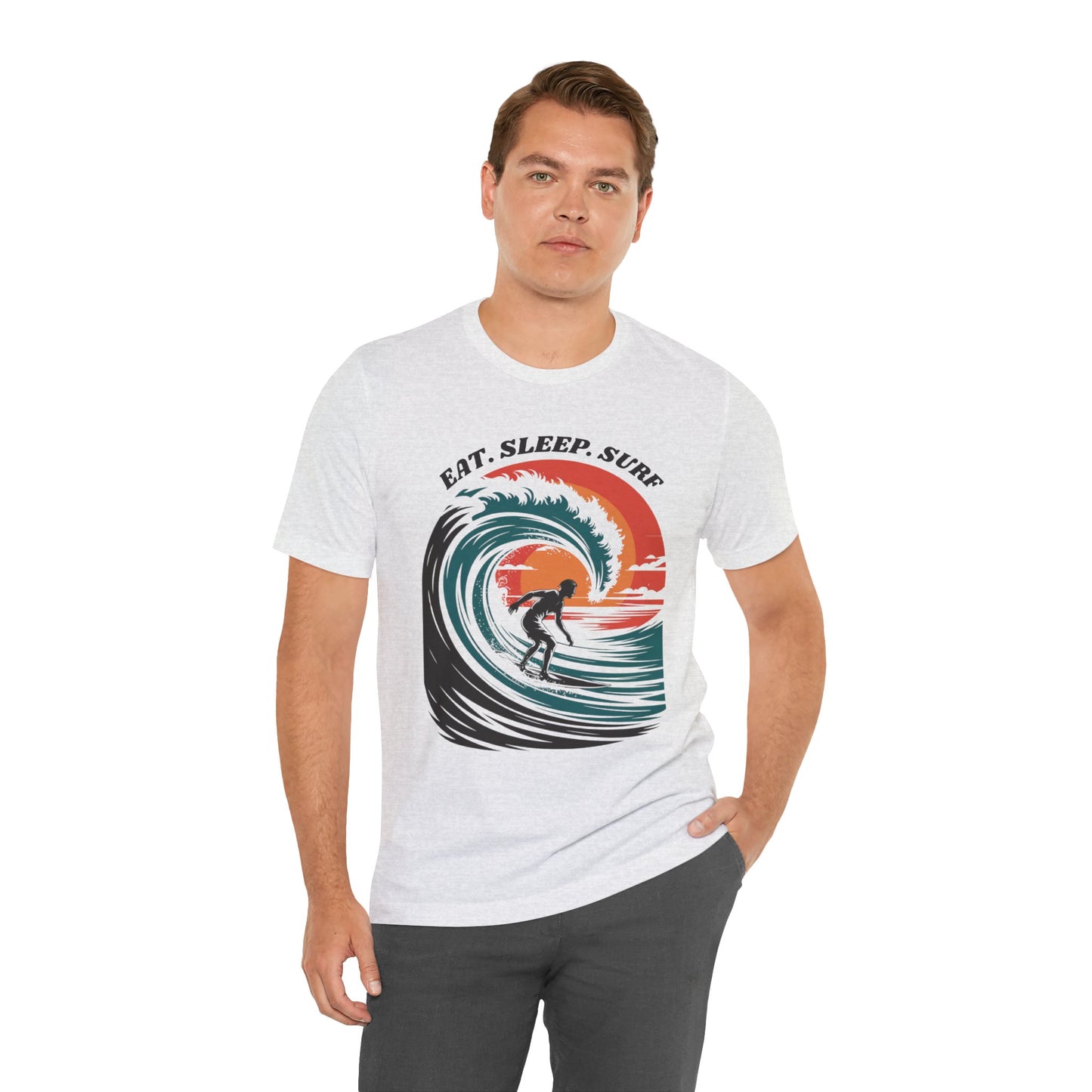 Surf Tee - Eat Sleep Surf Design featuring a man wearing a white tee with a surfer graphic, embodying a relaxed, beachy vibe ideal for surf enthusiasts. Perfect for casual, comfortable wear.