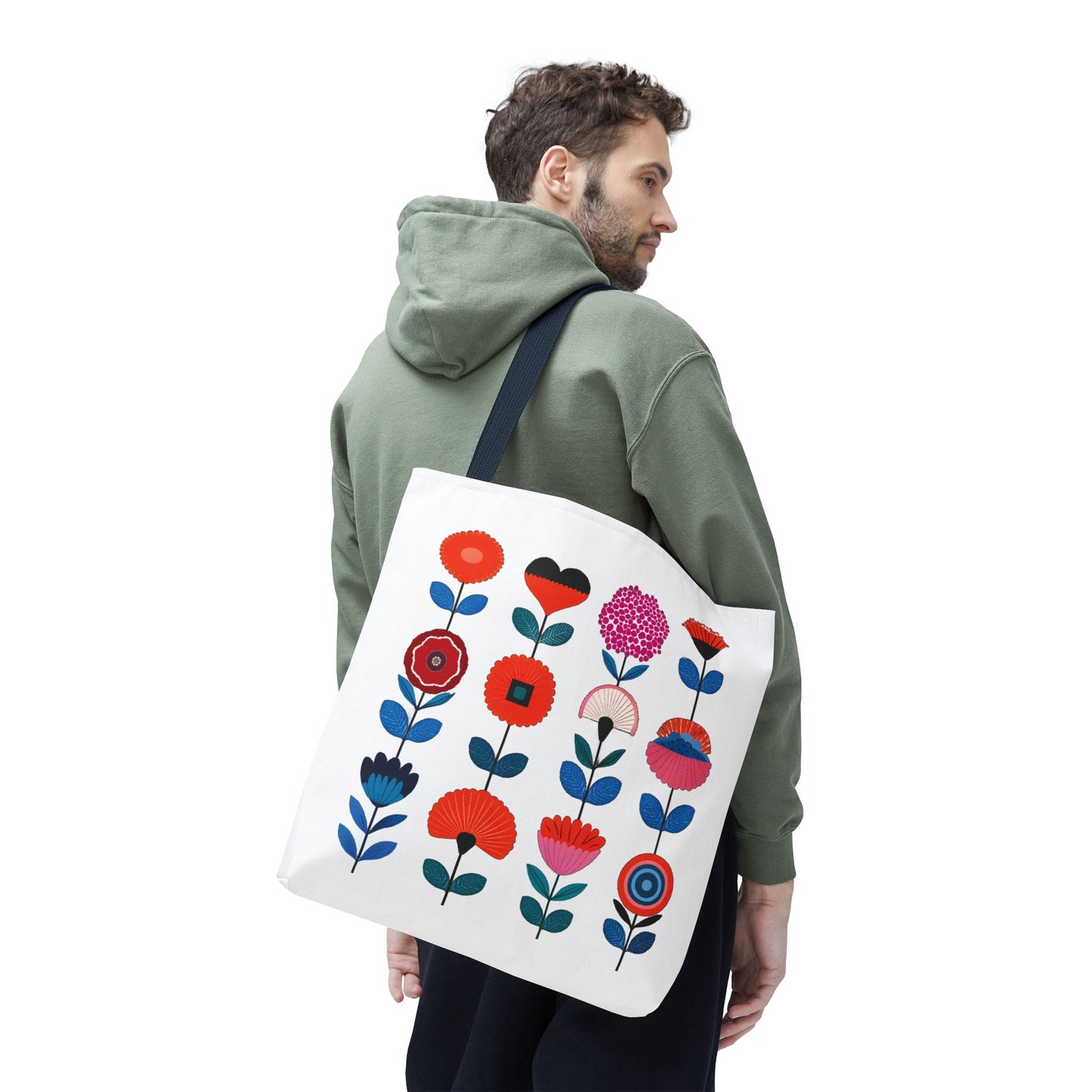 Floral Pattern Tote Bag: Man carrying a white tote with colorful floral design, showcasing durable polyester construction perfect for everyday use.