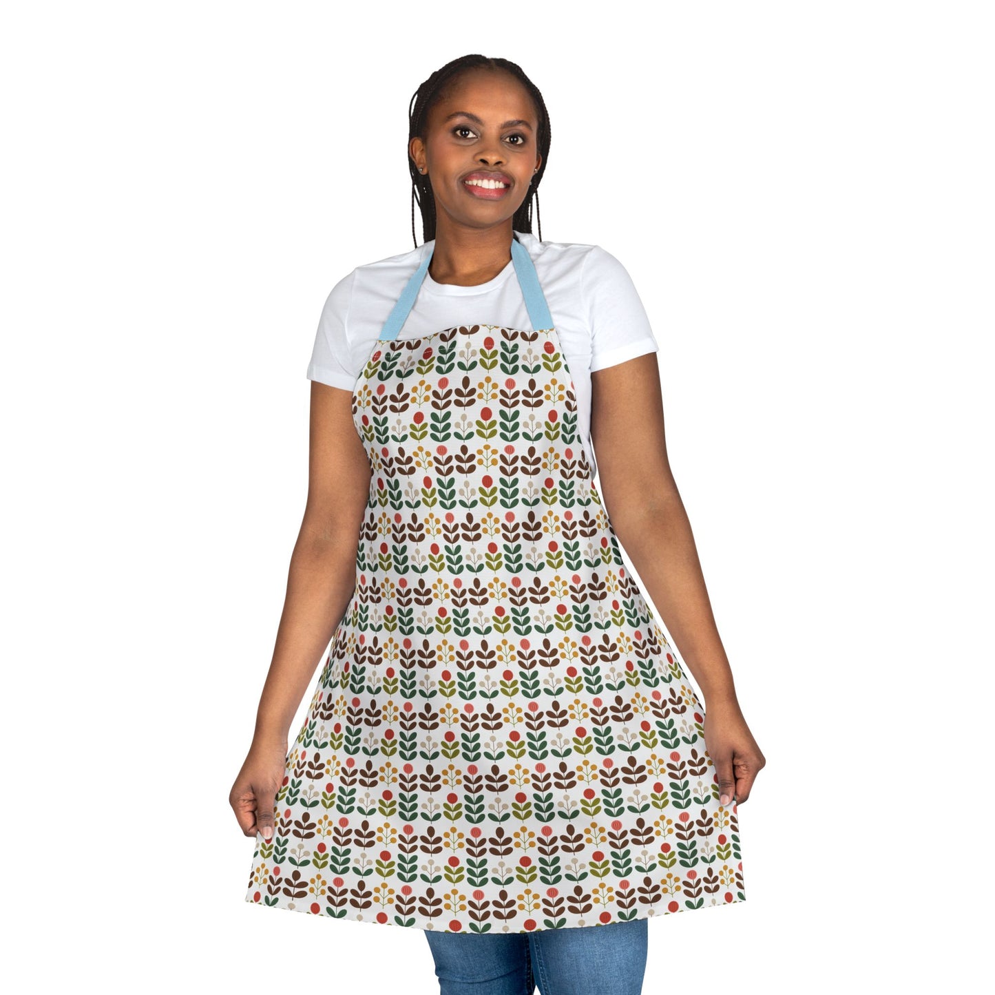 Flower Pattern Apron showcased on a smiling woman, highlighting its vibrant floral design and comfortable fit, ideal for creative cooks or artists, embodying FireBrook Essentials' uplifting style and practicality.
