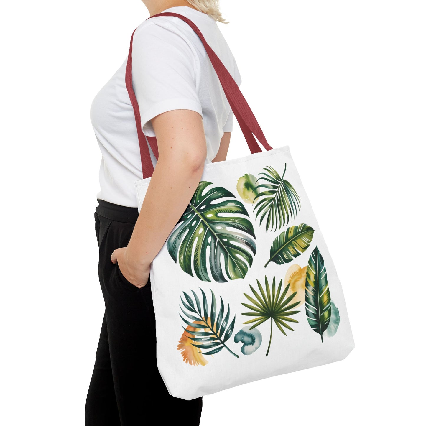 Tropical Leaves Tote Bag featuring a vibrant leaf pattern, ideal for beach trips or shopping. Spacious and durable with reinforced handles, embodying FireBrook Designs' blend of style and practicality.