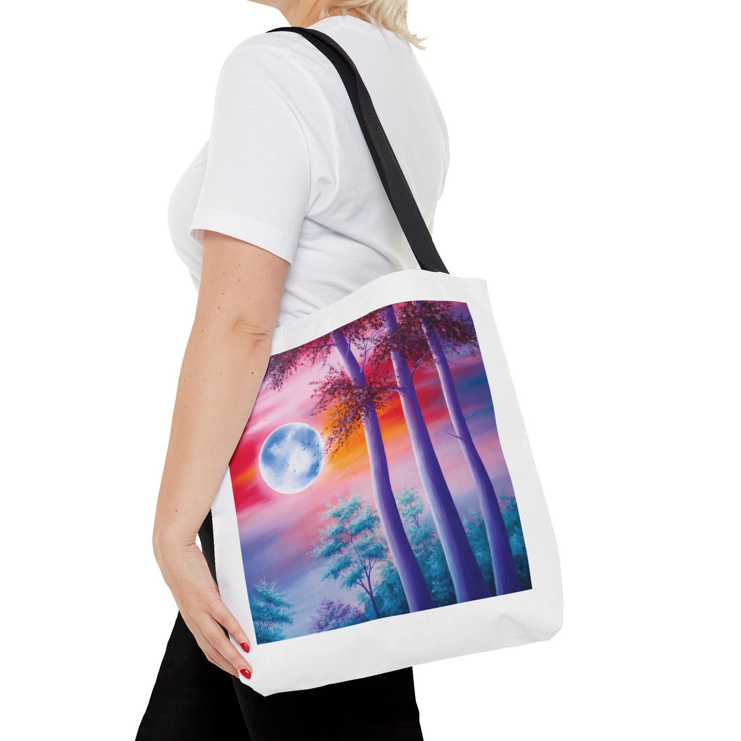 Moonlit Forest Tote Bag featuring an ethereal full moon scene with towering trees against a dramatic sunset sky, embodying artistic and nature-inspired elegance. Ideal for everyday use and gifting.