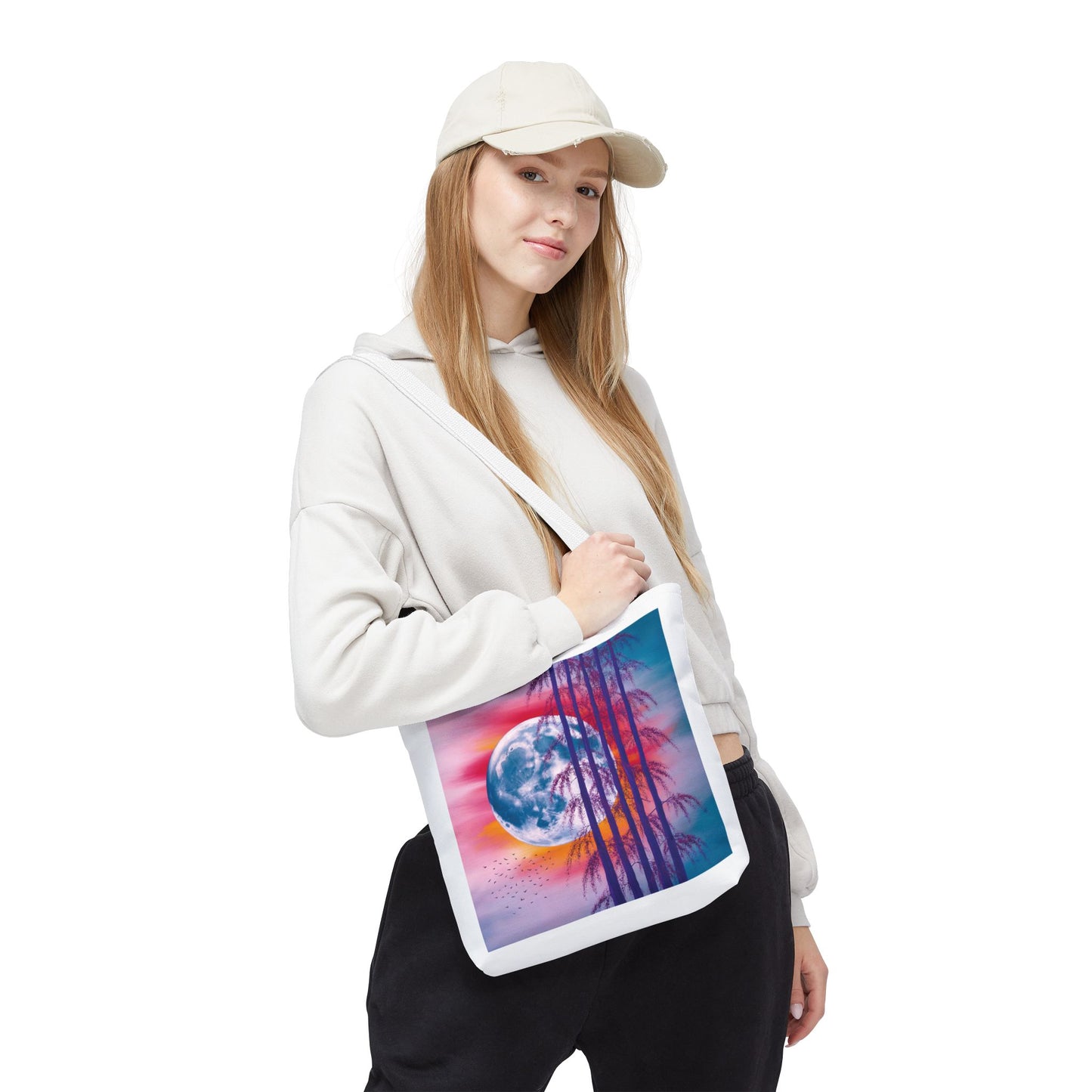 Moonlit Landscape Tote Bag features a vibrant full moon scene with silhouetted trees, embodying an abstract painting style. Ideal for nature enthusiasts, it's durable, spacious, and perfect for everyday use or gifting.