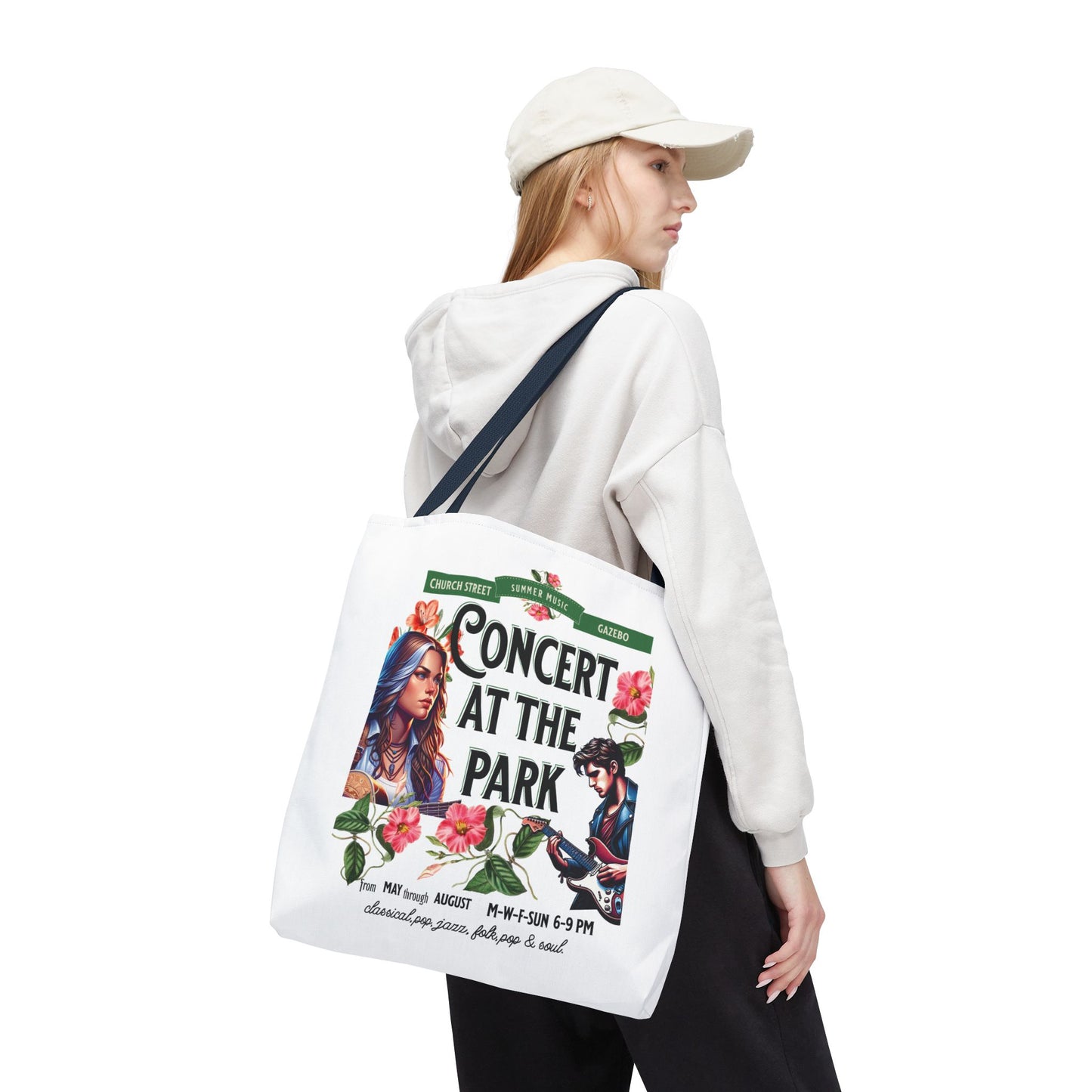 Concert At the Park Tote Bag featuring a woman holding it, showcasing a vibrant design with a woman and guitar, ideal for stylish outdoor activities.