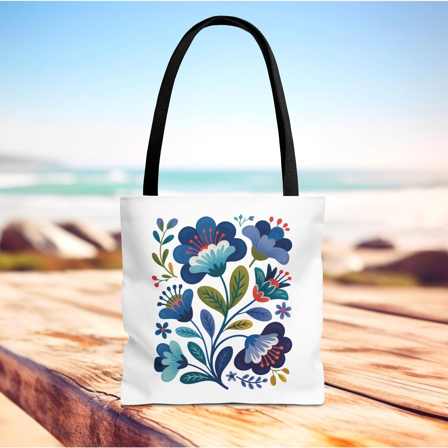 Vintage Folk Art Design Blue Floral Tote Bag with charming floral patterns, perfect for everyday use or special occasions. Features durable polyester, reinforced handles, and boxed corners for extra room. Available in various sizes.