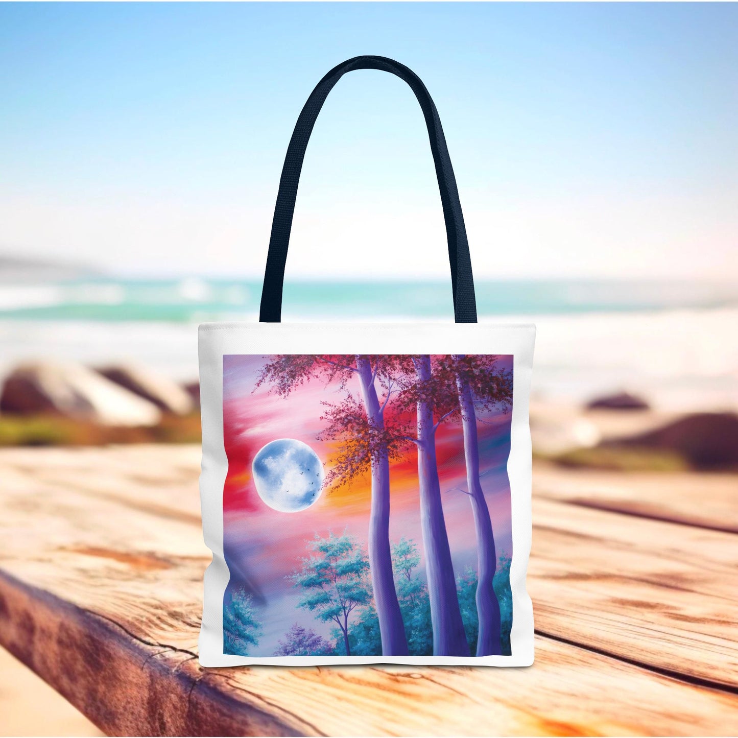 Moonlit Forest Tote Bag featuring a mystical full moon scene with towering trees against a dramatic sunset sky; perfect for art enthusiasts and nature lovers seeking stylish, durable everyday use or gifting.