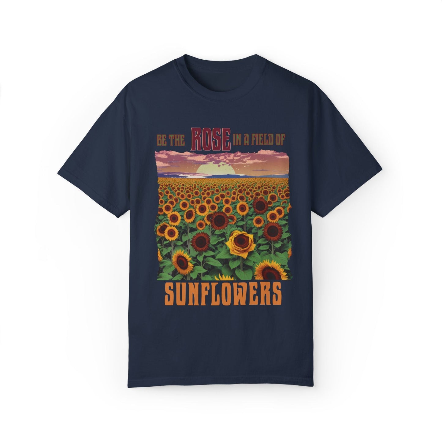 The Be the Rose in a Field of Sunflowers T-shirt features an inspiring quote, showcasing durable double-needle stitching and garment-dyed softness, perfect for spreading positivity with FireBrook Essentials' stylish, comfortable apparel.