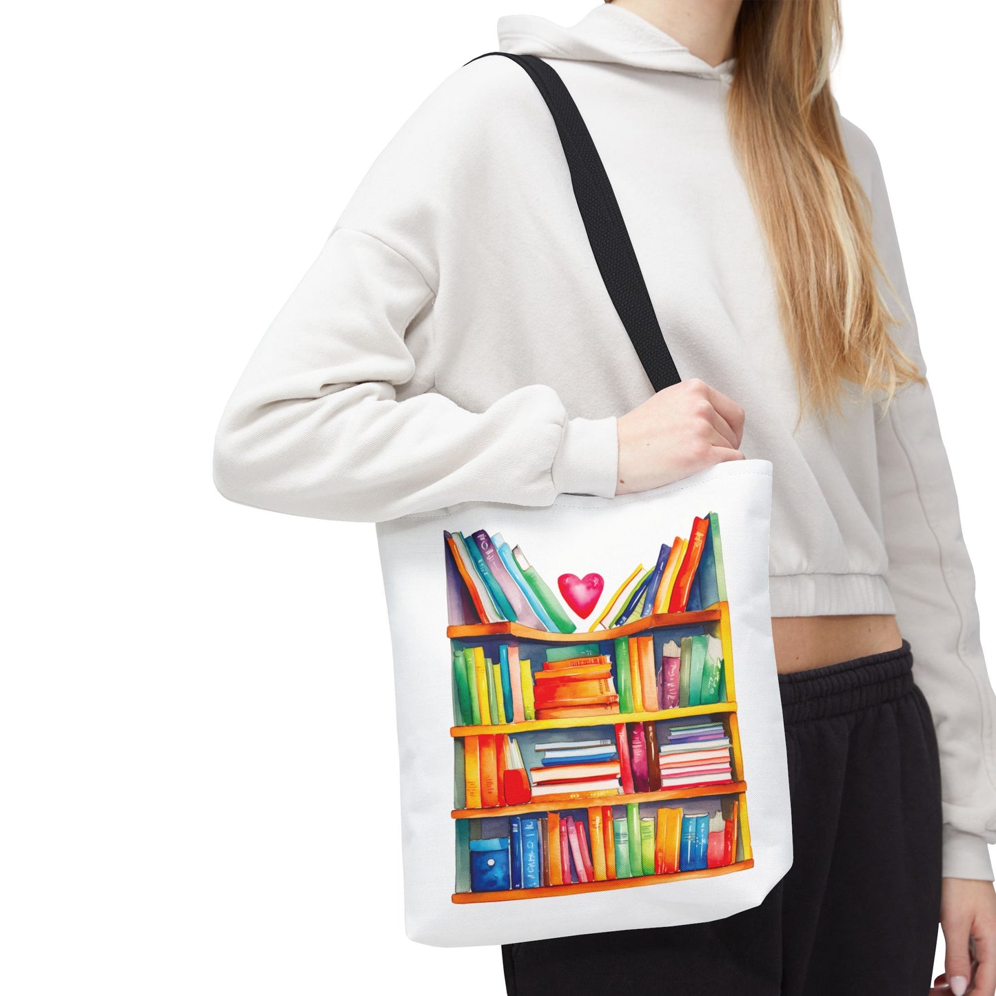 Books Tote Bag - 100% Spun Polyester, featuring a bookcase design, held by a woman, ideal for book lovers and everyday use.