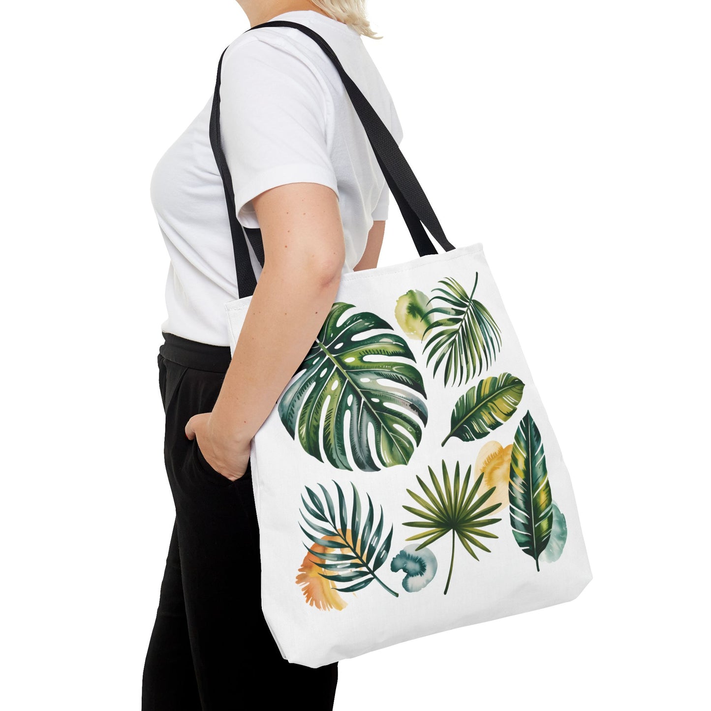 Tropical Leaves Tote Bag: A close-up of the tote bag showcases its vibrant tropical leaf design, highlighting its spacious and durable features, ideal for stylish beach outings or shopping trips.