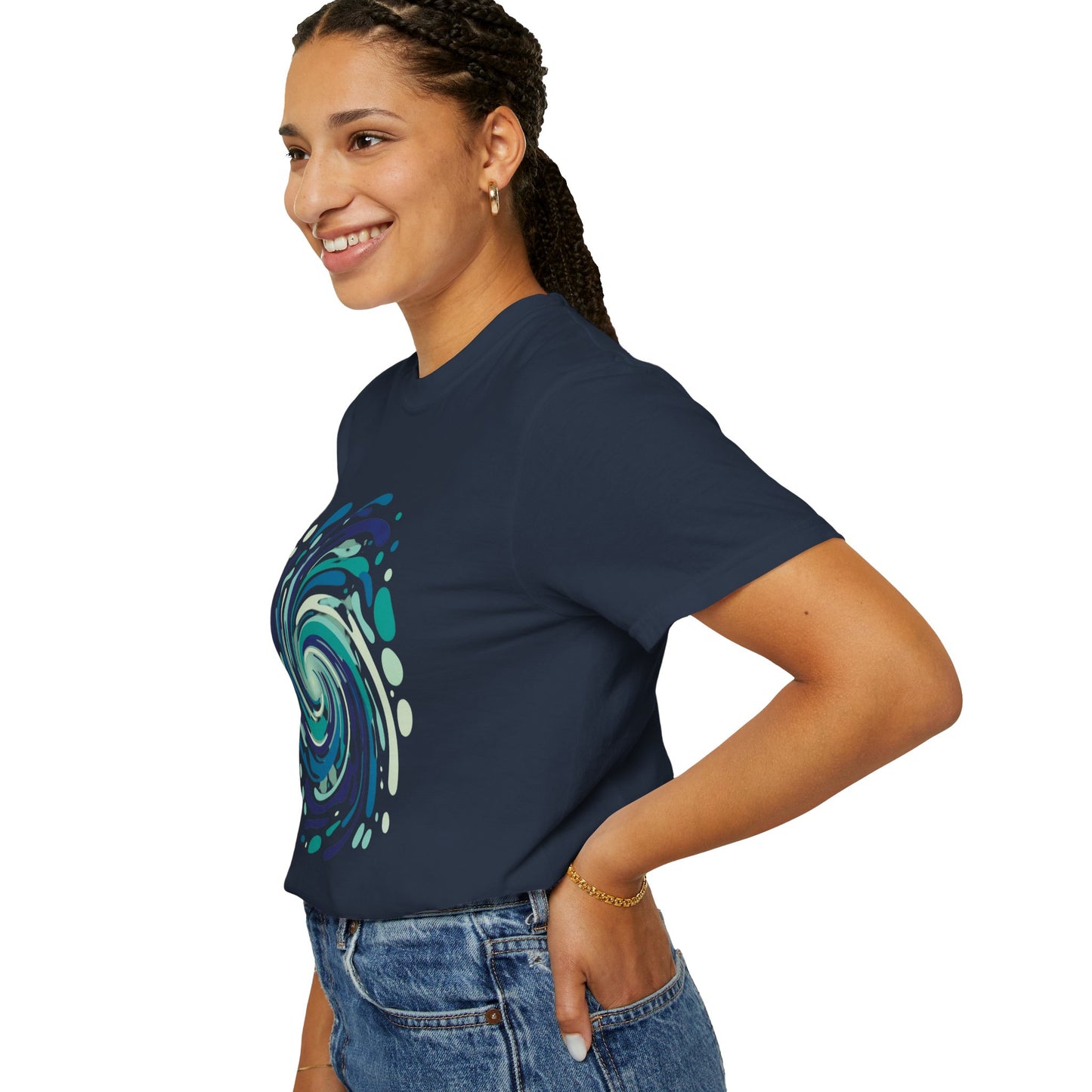 Ocean Waves Abstract T-Shirt featuring a swirling vortex design with fluid lines and bubble-like shapes. Made from soft, garment-dyed cotton, perfect for casual summer outings or beach vacations.
