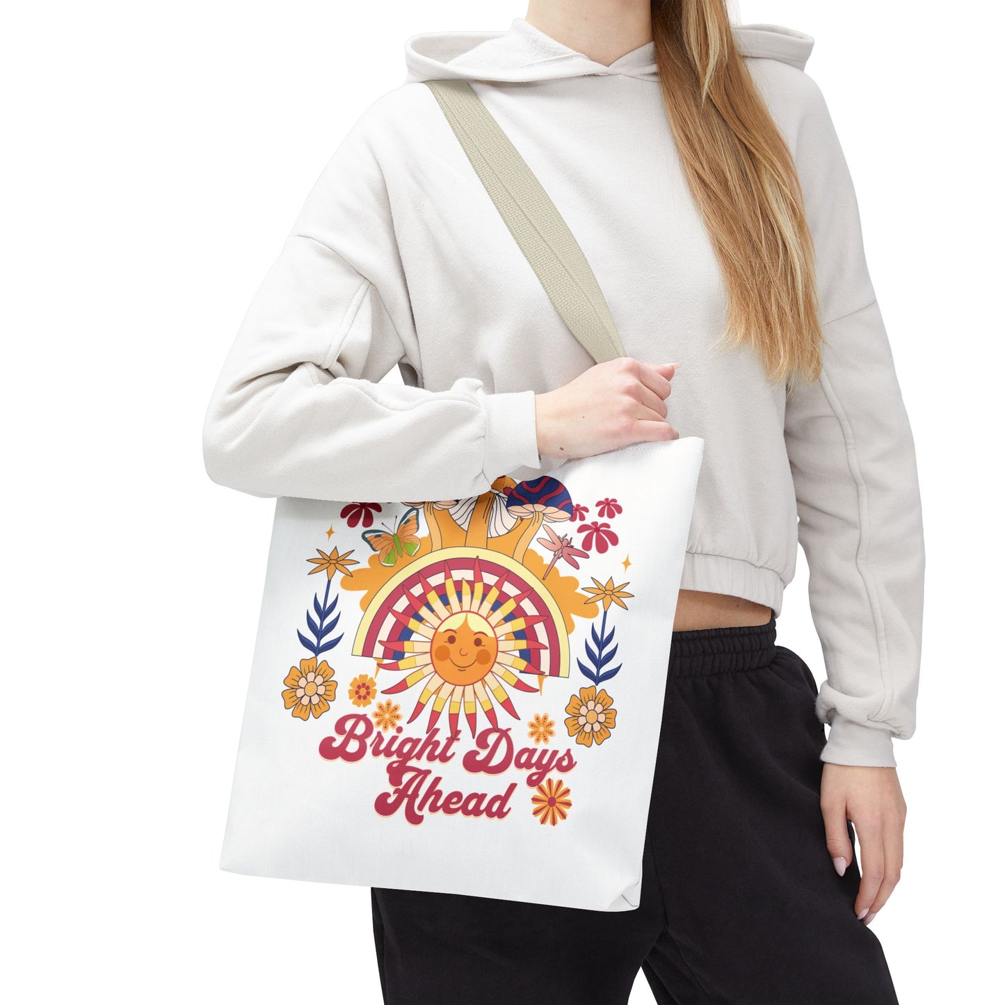 Bright Days Ahead Sunshine Floral Tote Bag adorned with sunshine, flowers, and butterflies. Ideal for joyful adventures, its durable polyester design and reinforced handles make it perfect for beach trips and picnics.