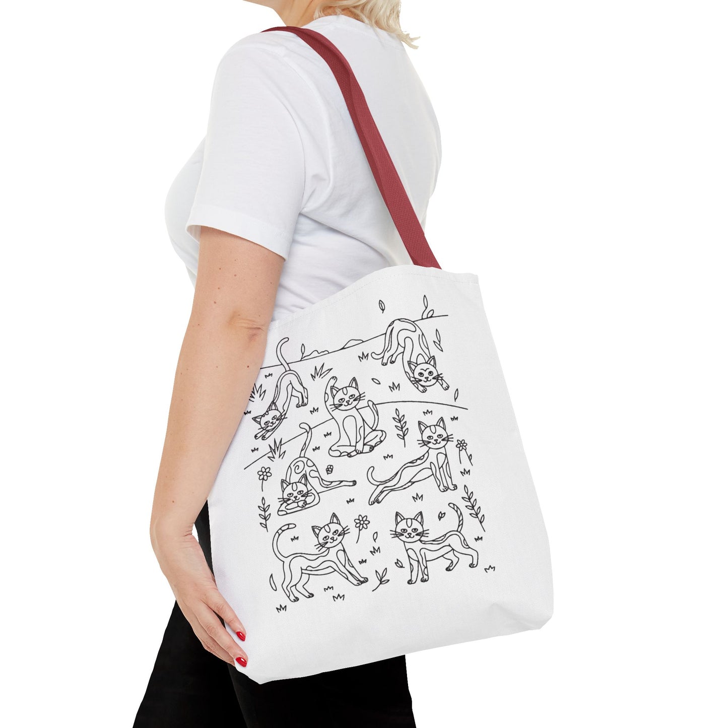 Yoga Cat Tote Bag featuring whimsical cat yoga poses, ideal for cat lovers. Durable 100% polyester with reinforced handles, perfect for everyday errands. Available in three sizes for versatile use.
