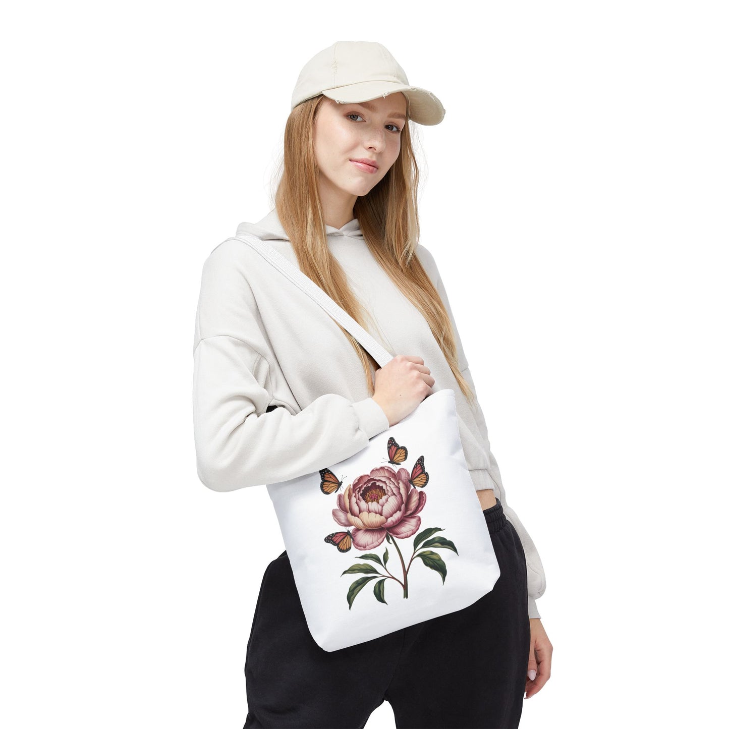 Botanical with Vintage-Inspired Illustration Tote Bag showcasing vibrant flowers, intricate leaves, and fluttering butterflies, perfect for nature lovers seeking a whimsical, durable carry-all for everyday use.