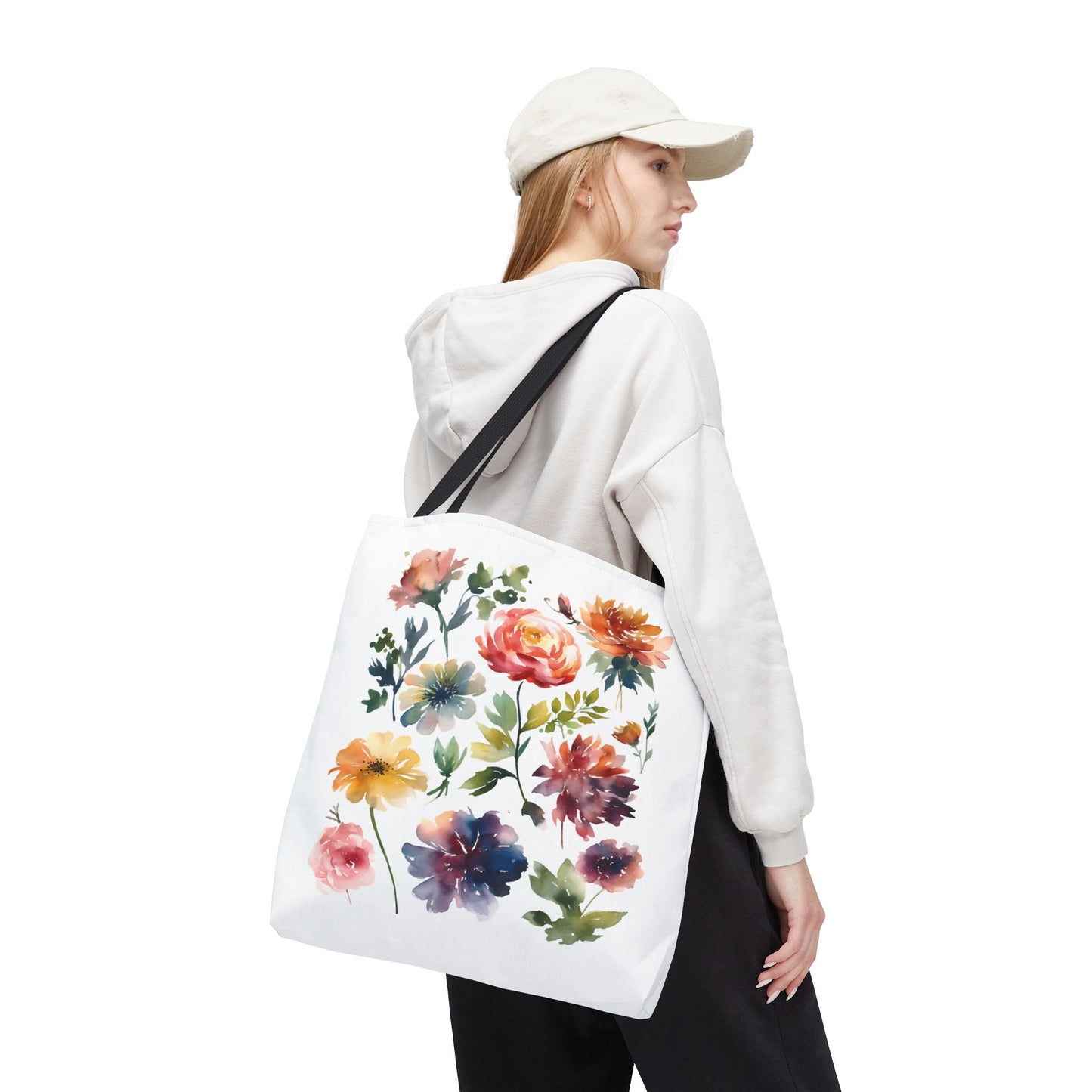 Watercolor Floral Tote Bag held by a woman, featuring vibrant flower artwork, ideal for stylish, everyday use.