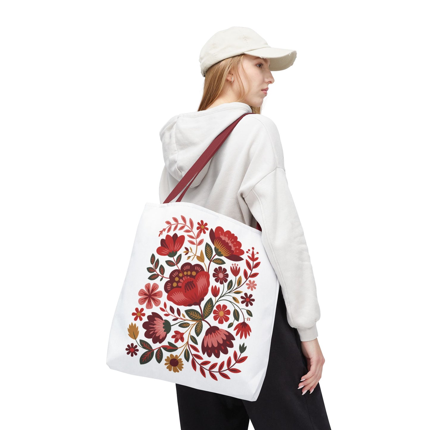 Red Floral Folk-Art Style Tote Bag featuring vibrant organic floral illustrations in red tones with soft blush, blue, green, and orange accents, designed for everyday use by nature lovers and art enthusiasts.