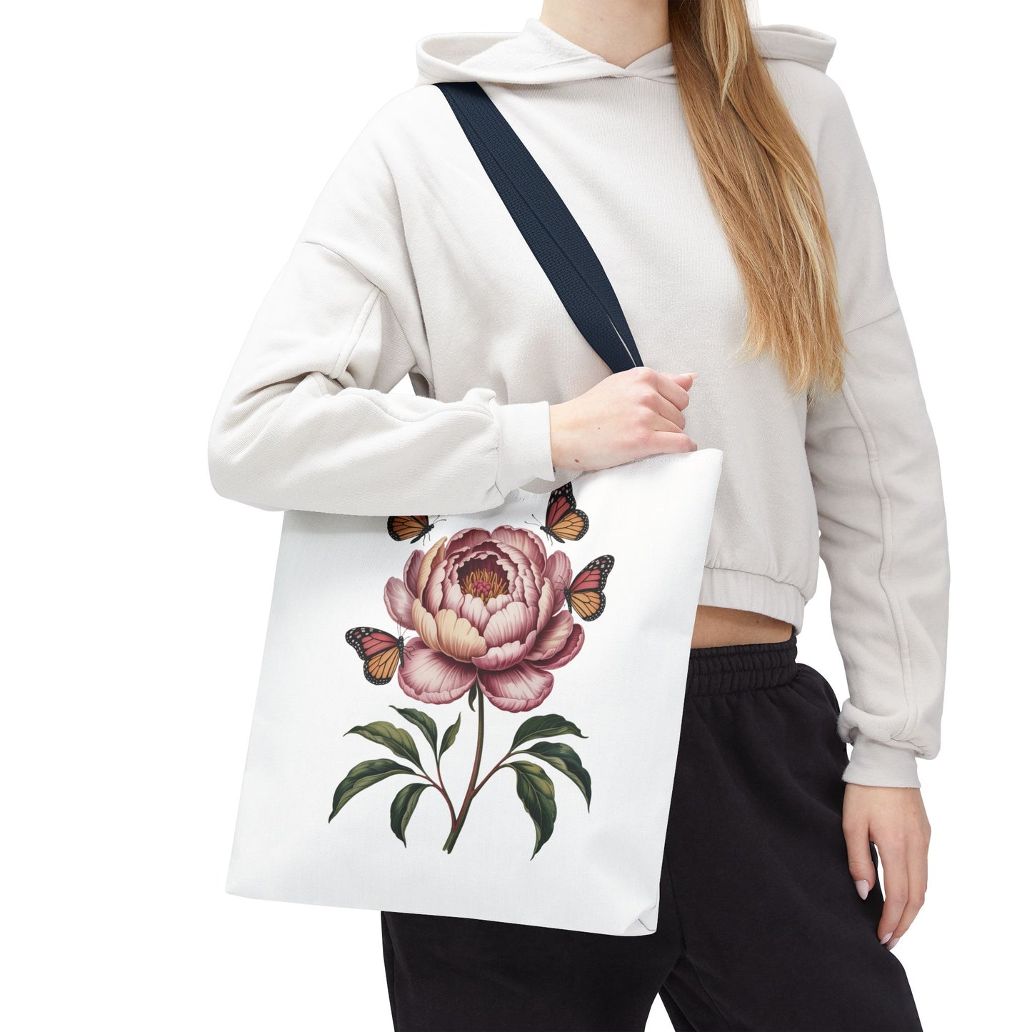 Botanical with Vintage-Inspired Illustration Tote Bag featuring vibrant flowers, intricate leaves, and butterflies, perfect for nature lovers. Durable 100% polyester with reinforced handles, ideal for shopping or casual outings.
