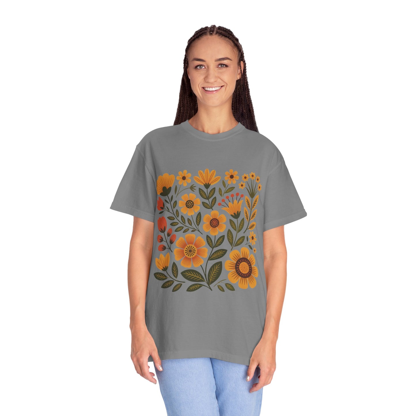 Folk Art in Warm Yellows Floral T-Shirt showcases a vibrant, embroidery-inspired floral design. Crafted from soft, 100% ring-spun US cotton, it features a relaxed fit and durable stitching for artistic comfort.