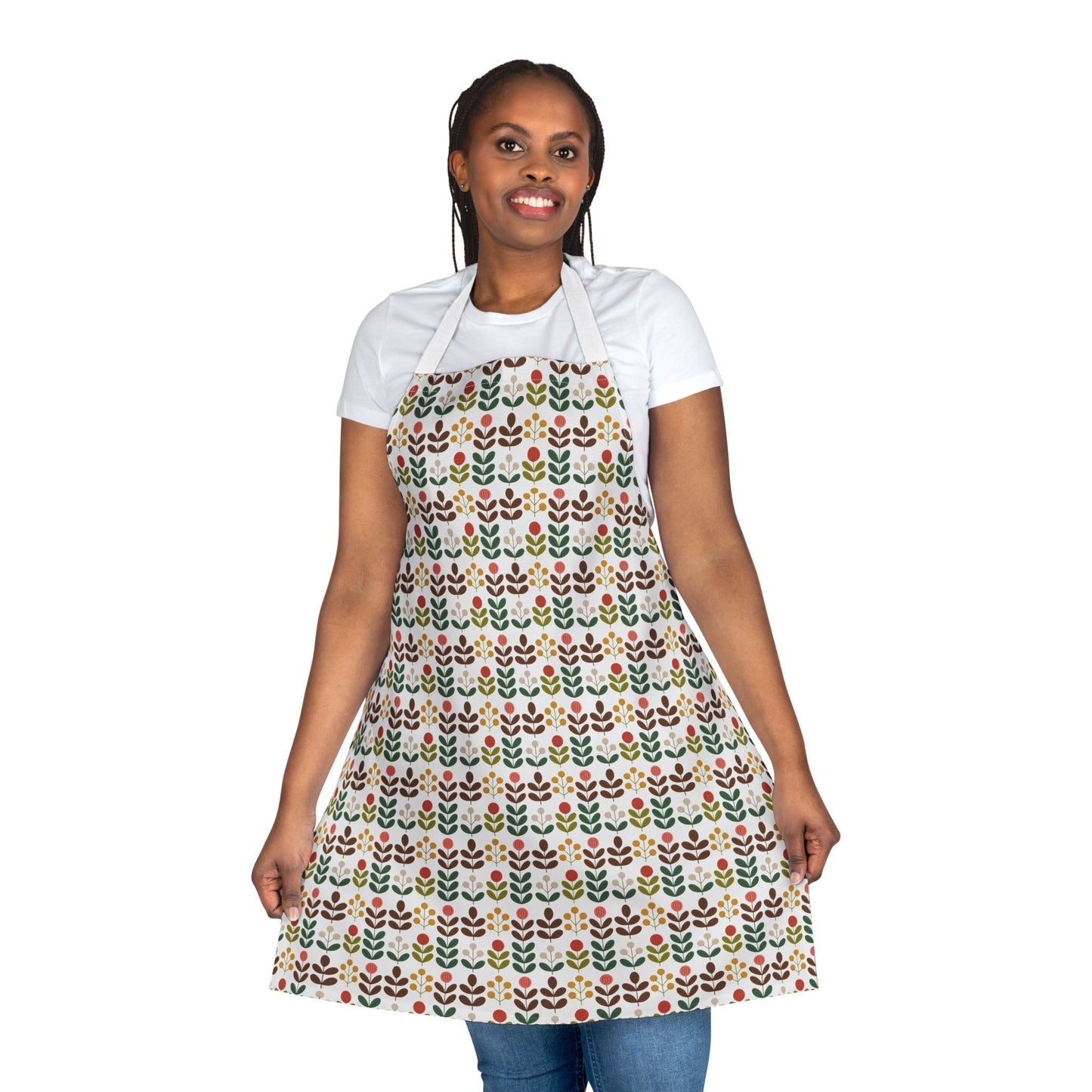 A woman models the Flower Pattern Apron, showcasing its vibrant design and comfortable fit, ideal for creative activities. The apron is tied at the back, emphasizing its stylish practicality.