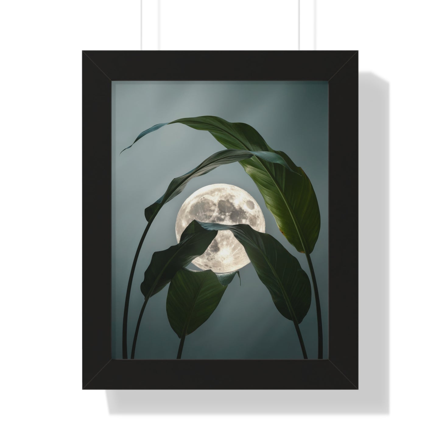 Vertical Moon and Tropical Leaves Poster: A framed artwork showcasing a luminous full moon partially hidden by oversized tropical leaves, creating an ethereal, serene atmosphere ideal for nature and moon enthusiasts.