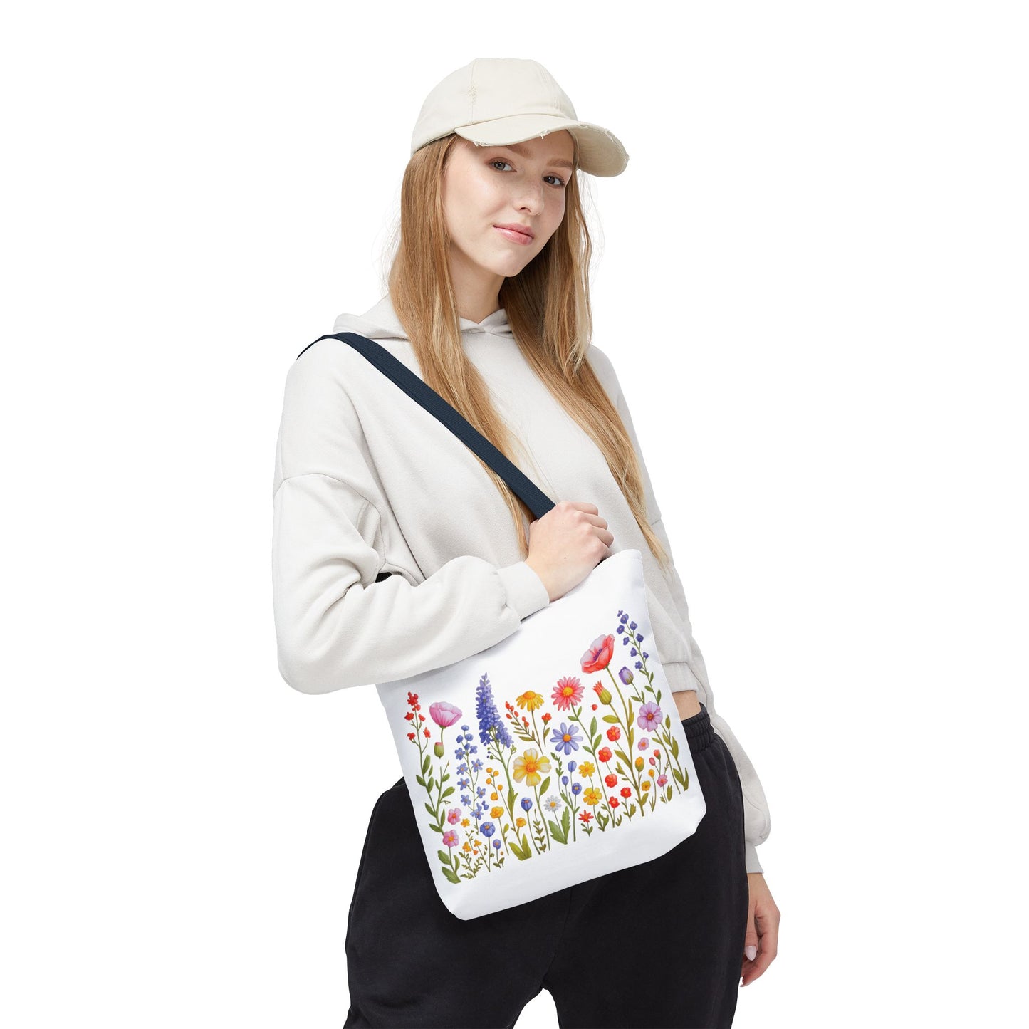 Wildflowers Tote Bag featuring a vibrant wildflower design, ideal for nature enthusiasts. Durable polyester with reinforced handles, offering three sizes for versatile use, embodying FireBrook Essentials' commitment to stylish, joyful living.