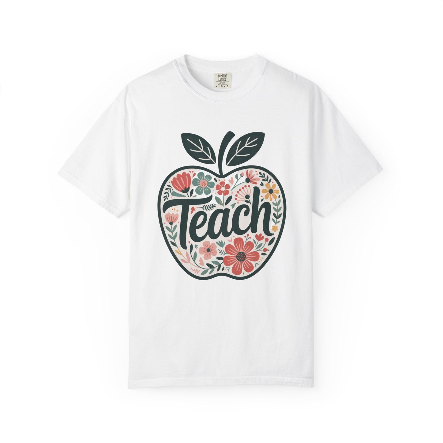 Floral Apple TEACH T-shirt features a large, hand-drawn apple shape with pastel florals and TEACH text, offering a cheerful, artistic vibe, perfect for educators and nature lovers.