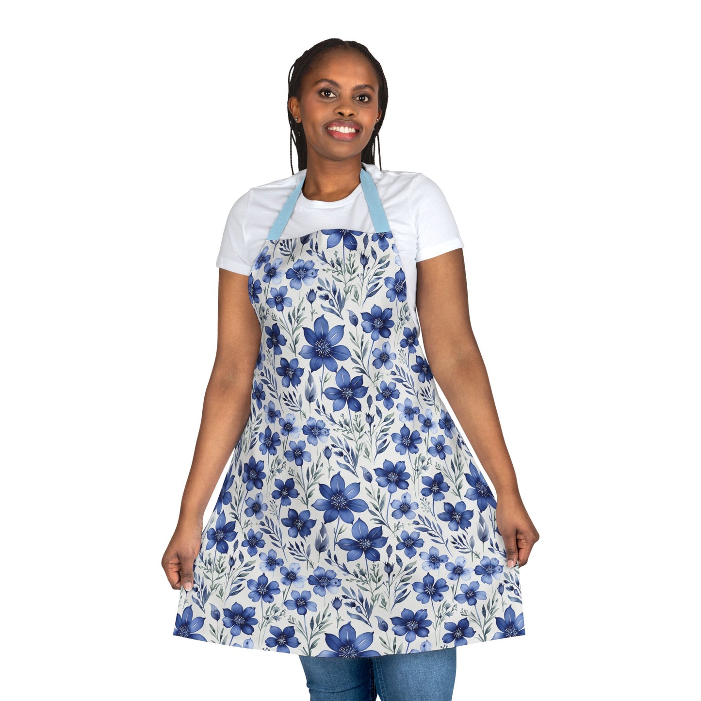 Apron, Blue Wildflower Pattern: Close-up of a hand-painted indigo blue apron featuring a wildflower design, showcasing artistic watercolor texture, ideal for chefs, artists, and gardeners seeking style and comfort.