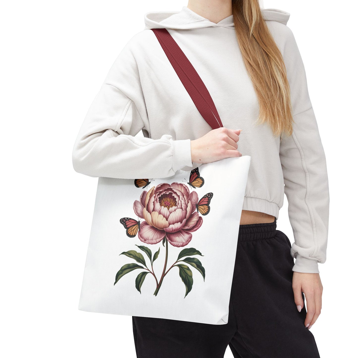 Botanical with Vintage-Inspired Illustration Tote Bag showcasing vibrant flowers, intricate leaves, and butterflies. Ideal for nature lovers, adding a whimsical touch to shopping or casual outings. Durable polyester with reinforced handles.