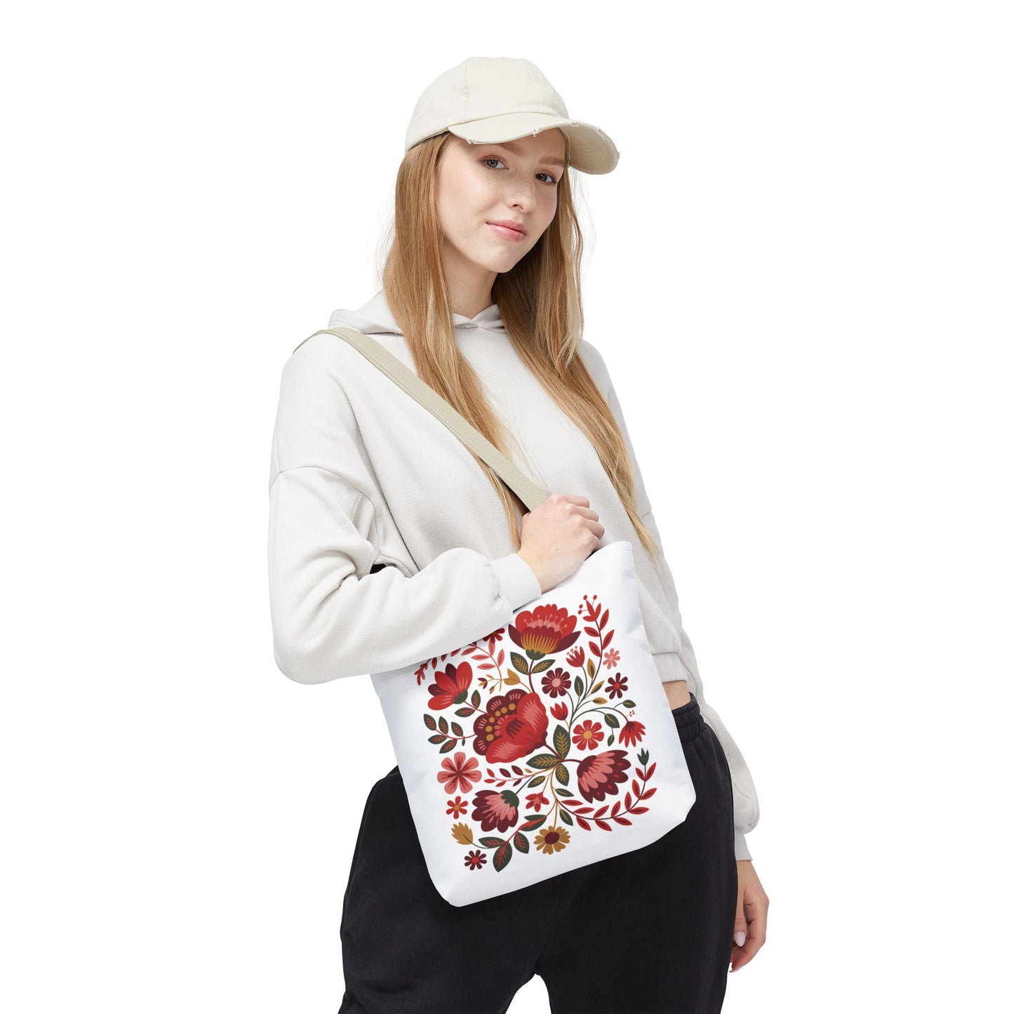 Red Floral Folk-Art Style Tote Bag featuring vibrant, organic floral illustrations in red tones with green leaves and navy accents. Ideal for everyday use, highlighting FireBrook Essentials' joyful and uplifting design ethos.