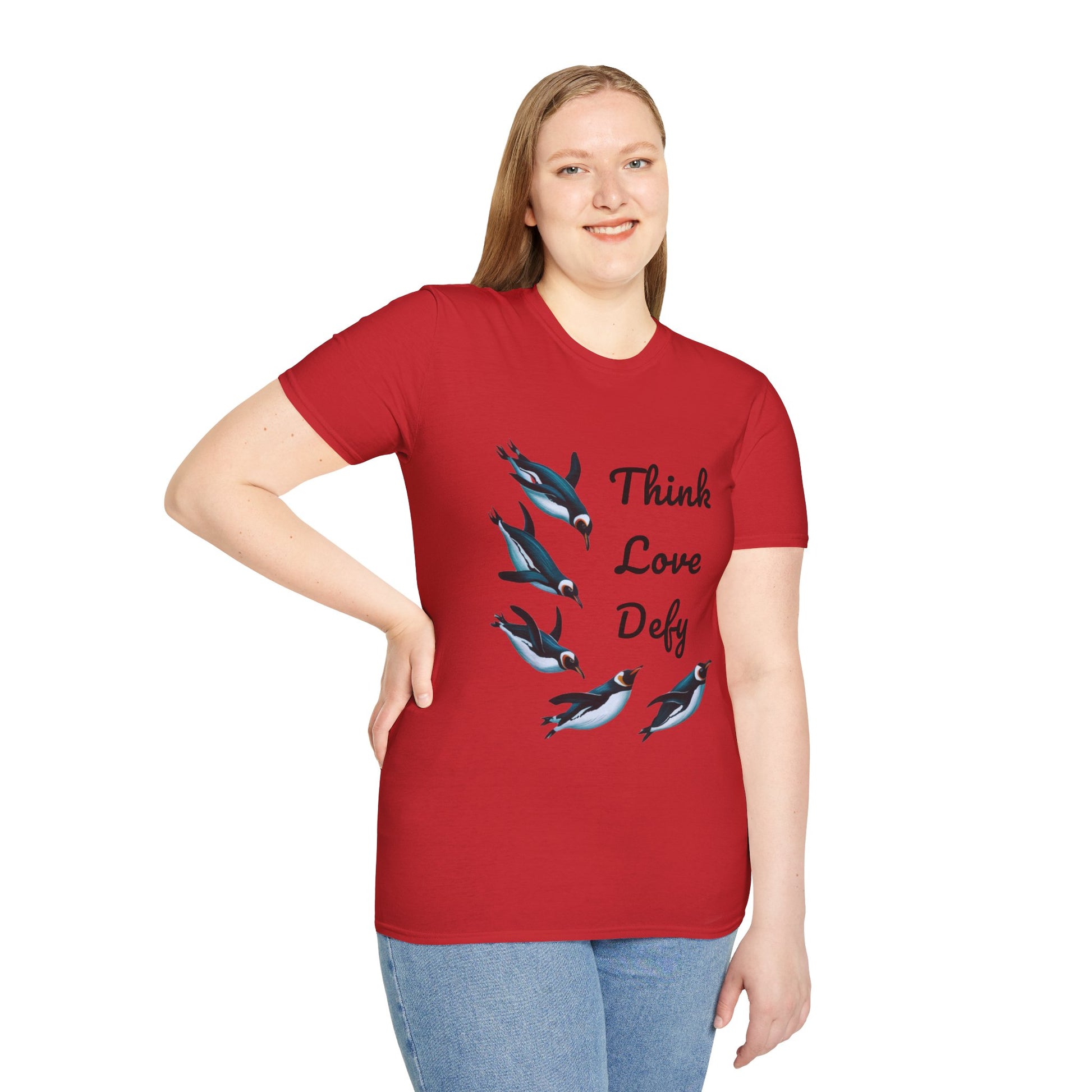 Think Love Defy Penguin Animal Nature Gildan Unisex T-Shirt featuring playful penguin graphics, worn by a smiling woman. Perfect for nature enthusiasts, emphasizing comfort and style in casual settings.