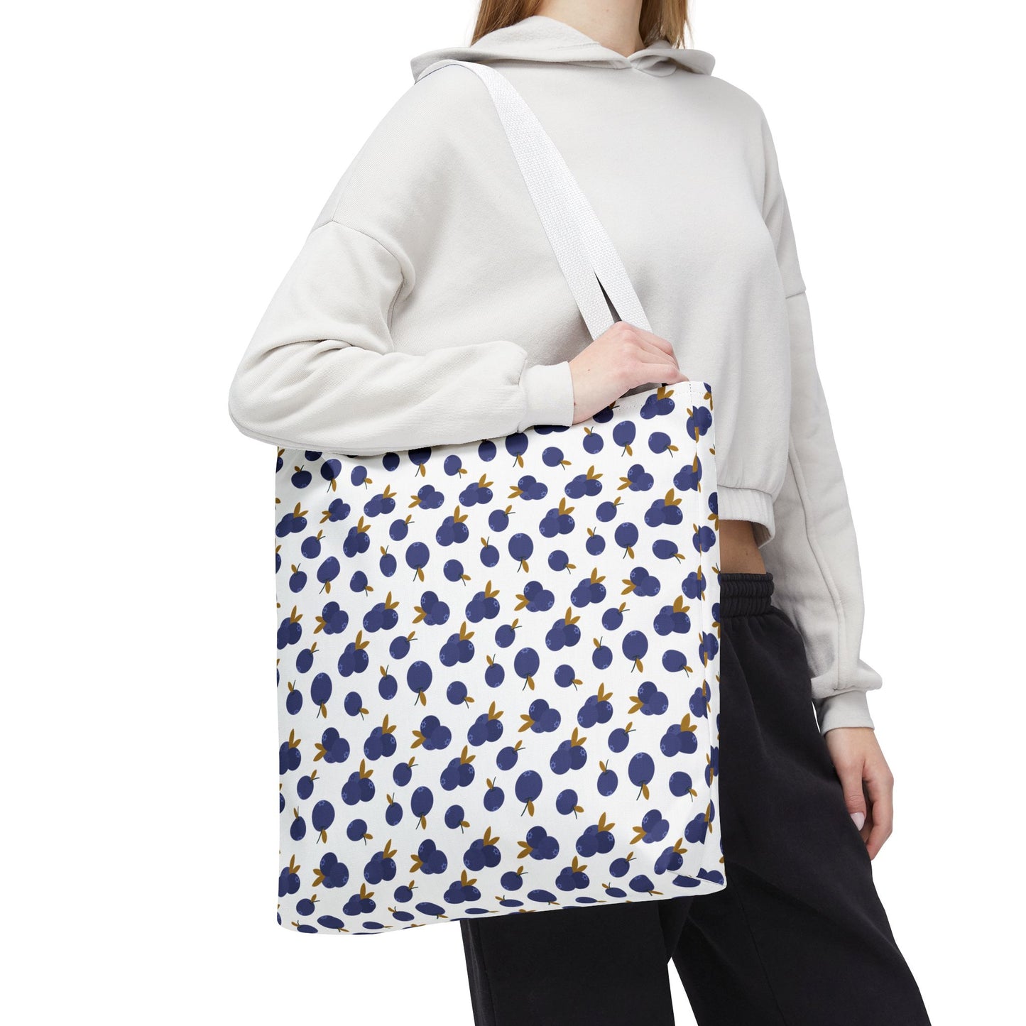 Blueberry Tote Bag featuring a charming blueberry pattern, crafted from durable polyester with reinforced handles and boxed corners, ideal for carrying essentials stylishly and practically.