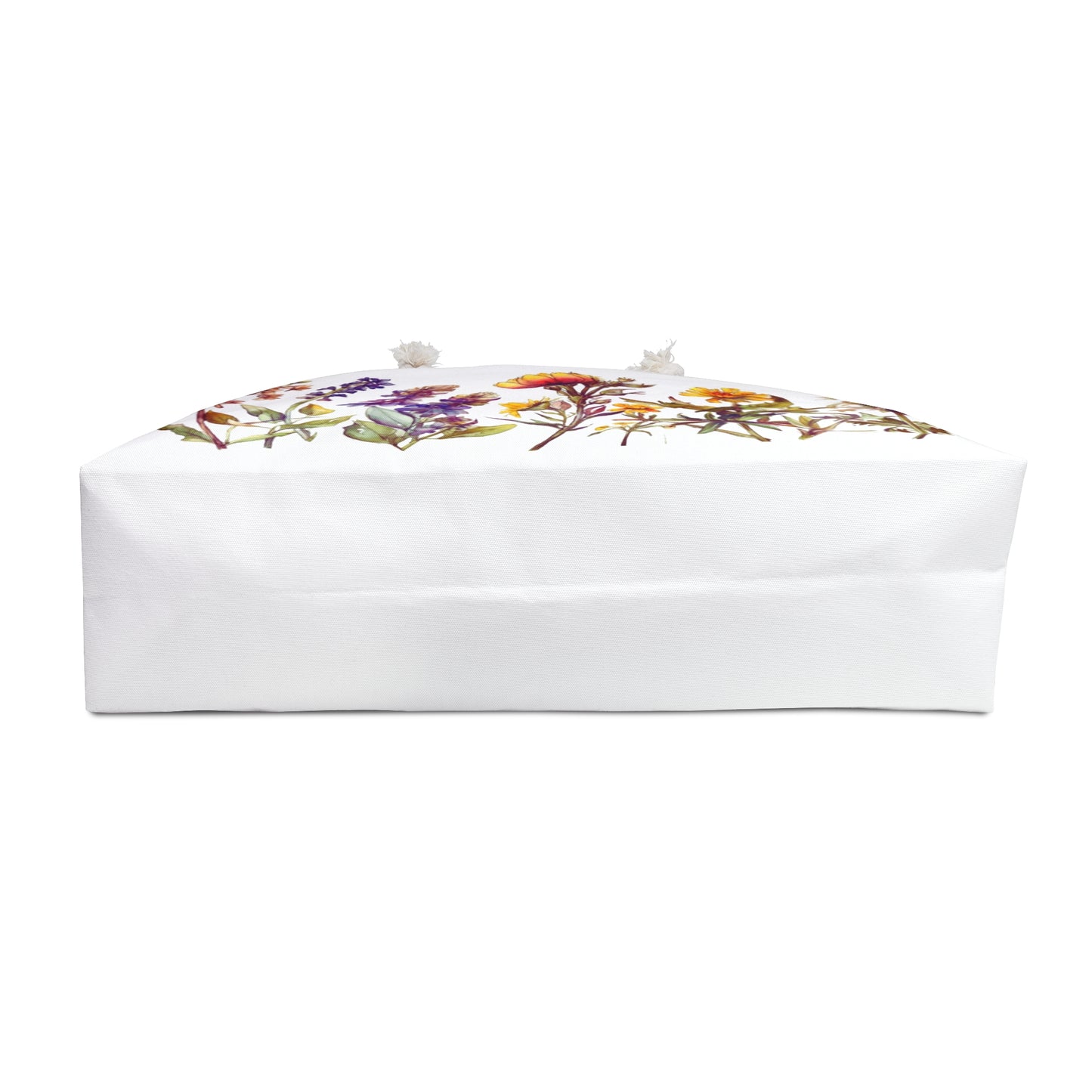 Weekender Bag Wildflowers: Close-up of a stylish, spacious bag adorned with a whimsical wildflower design, featuring durable rope handles and gold grommets, ideal for nature-loving travelers seeking elegance and practicality.