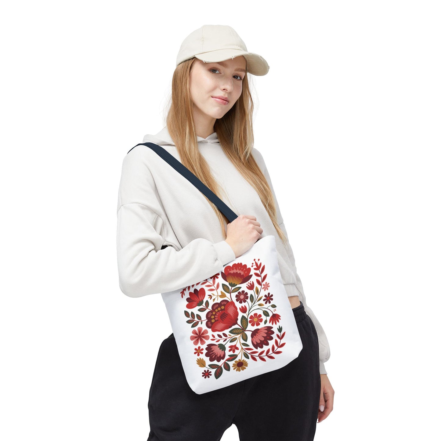 Red Floral Folk-Art Style Tote Bag features vibrant organic floral illustrations in red tones with green accents, perfect for carrying essentials stylishly, embodying FireBrook Essentials' uplifting design aesthetic.