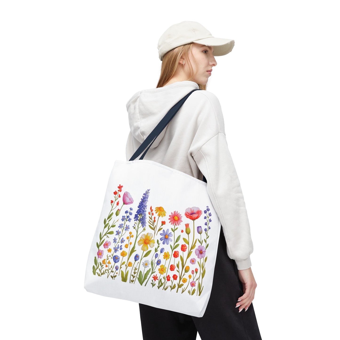 Wildflowers Tote Bag showcasing a charming wildflower design, embodying a natural, free-spirited vibe. Constructed from durable polyester with reinforced handles, perfect for nature lovers and everyday use. Available in multiple sizes.
