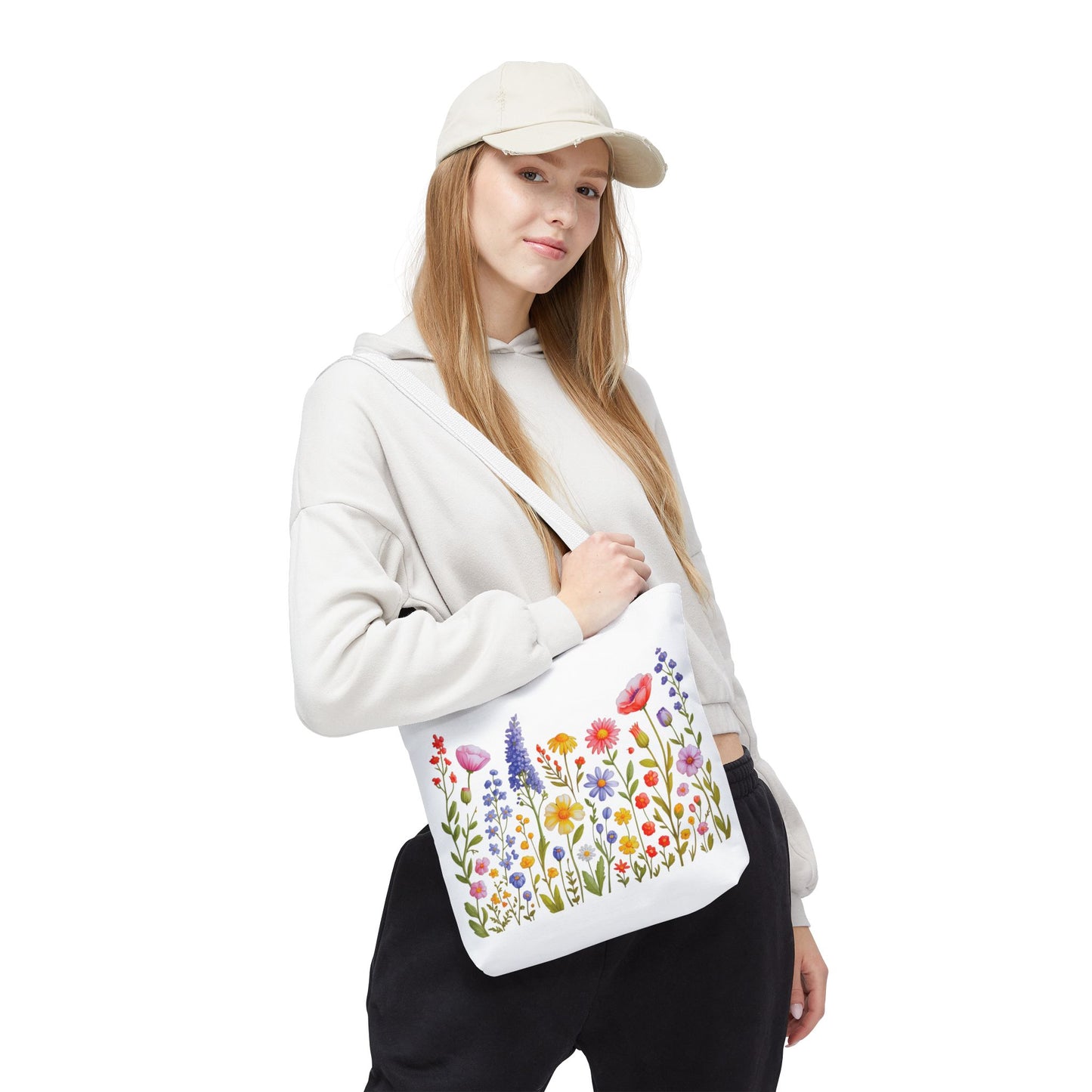 Wildflowers Tote Bag, featuring a vibrant wildflower design, embodies a free-spirited, natural vibe. Crafted from durable polyester with reinforced handles, it's ideal for everyday use, enhancing joyful, stylish living from FireBrook Essentials.