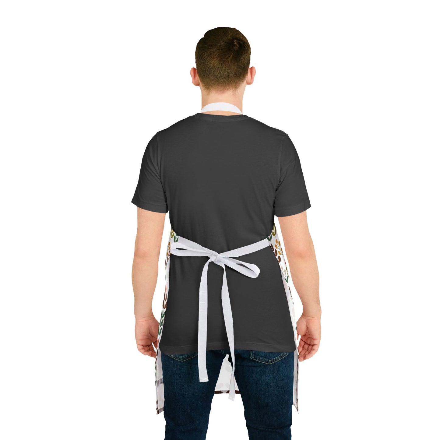 Flower Pattern Apron featuring a vibrant floral design, perfect for creative cooks or artists. The apron includes a tie-back closure and is made from stain-resistant polyester canvas for easy cleaning.