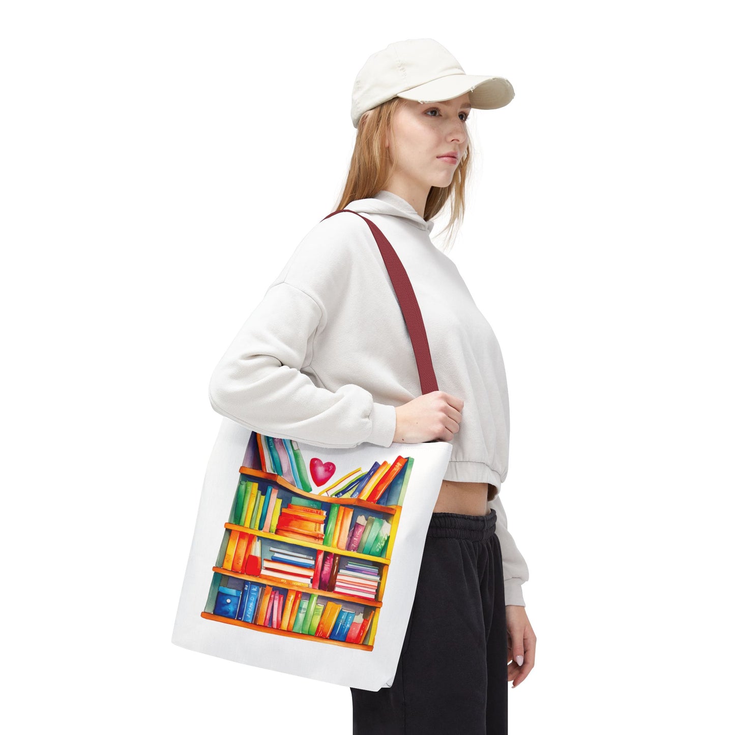Books Tote Bag - 100% Spun Polyester, held by a woman in a white sweater and cap, ideal for book lovers and everyday use.